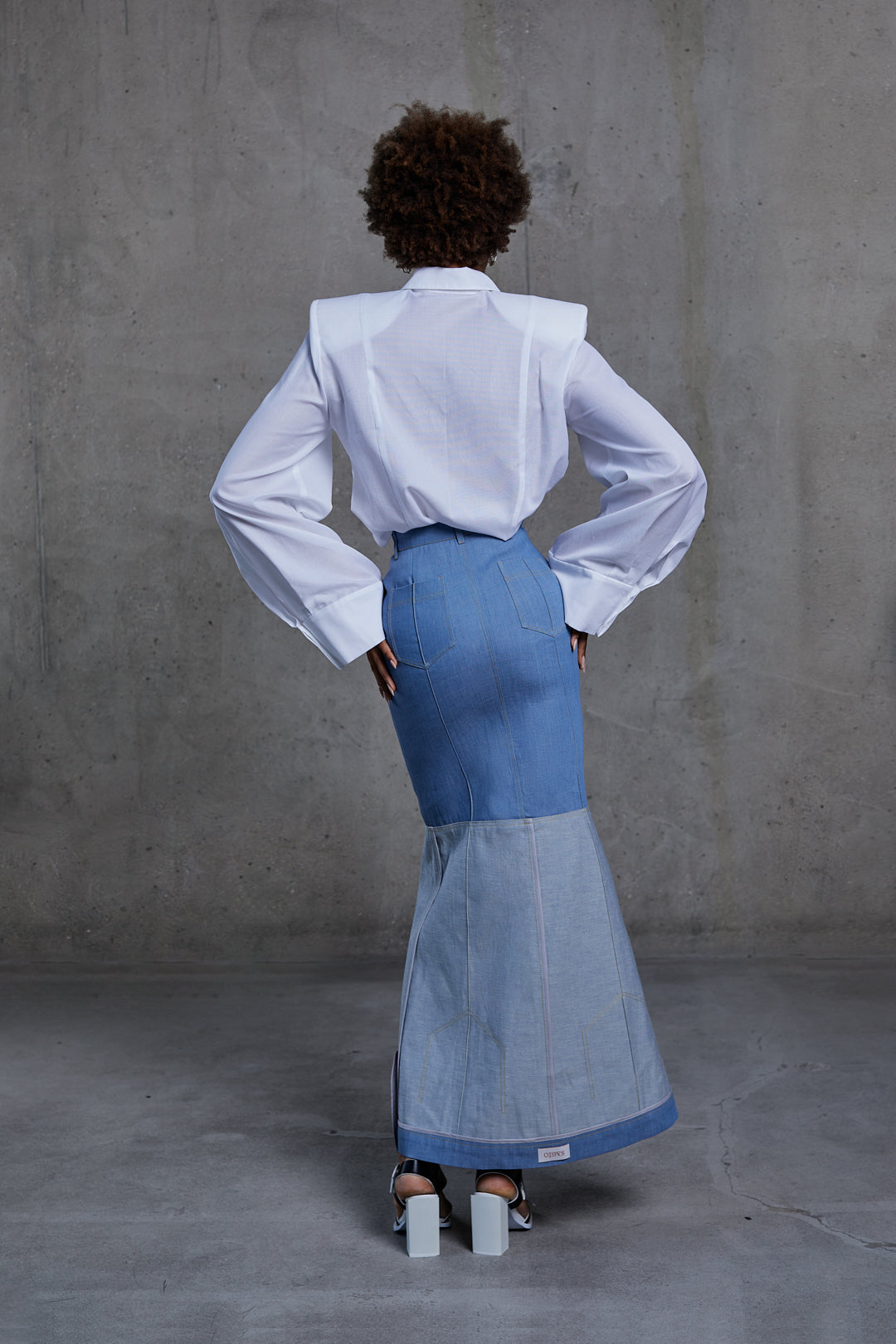 Denim dropped skirt, model front, high waist detail