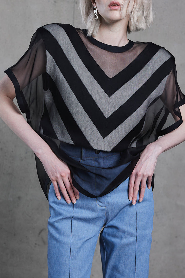 Front view, sheer geometric T-shirt with chevron V pattern, short sleeves