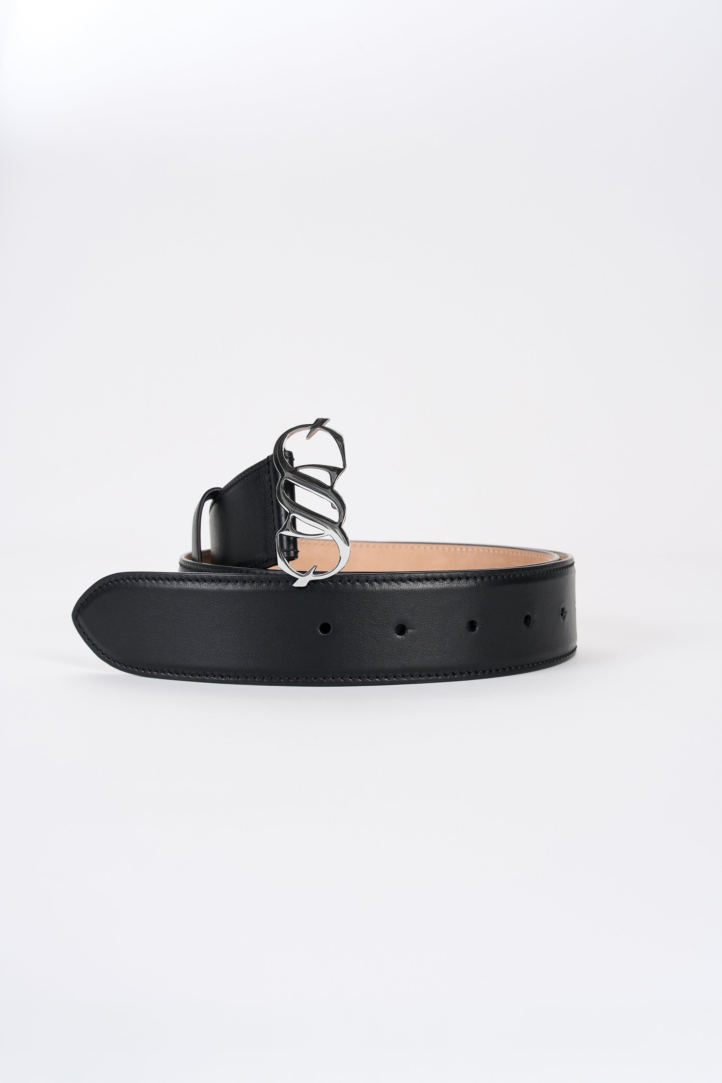 Black leather monogram belt with silver-tone buckle, angled view