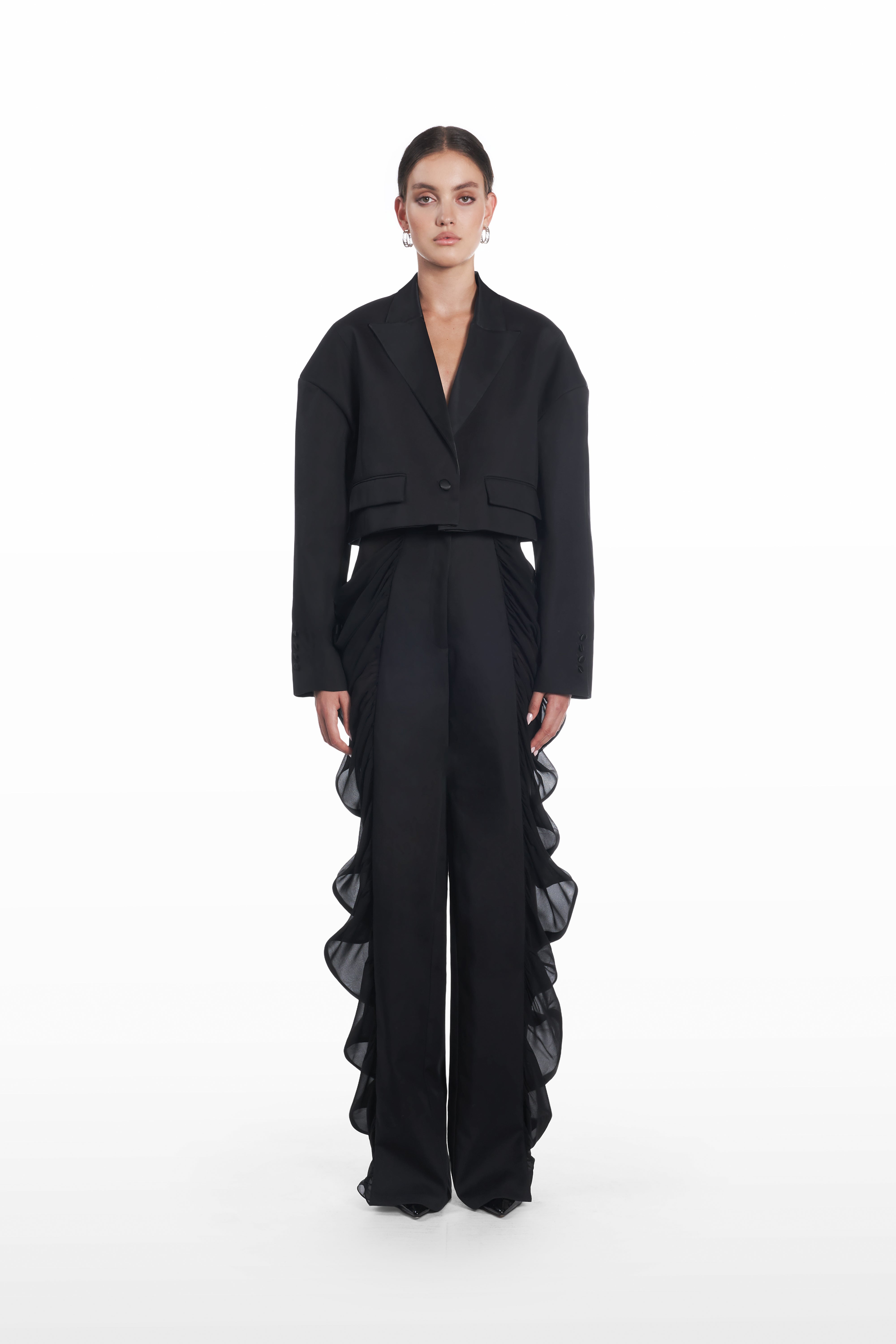 Falling Shoulders Crop Jacket in black, front view with cropped silhouette and sculptural dropped shoulders