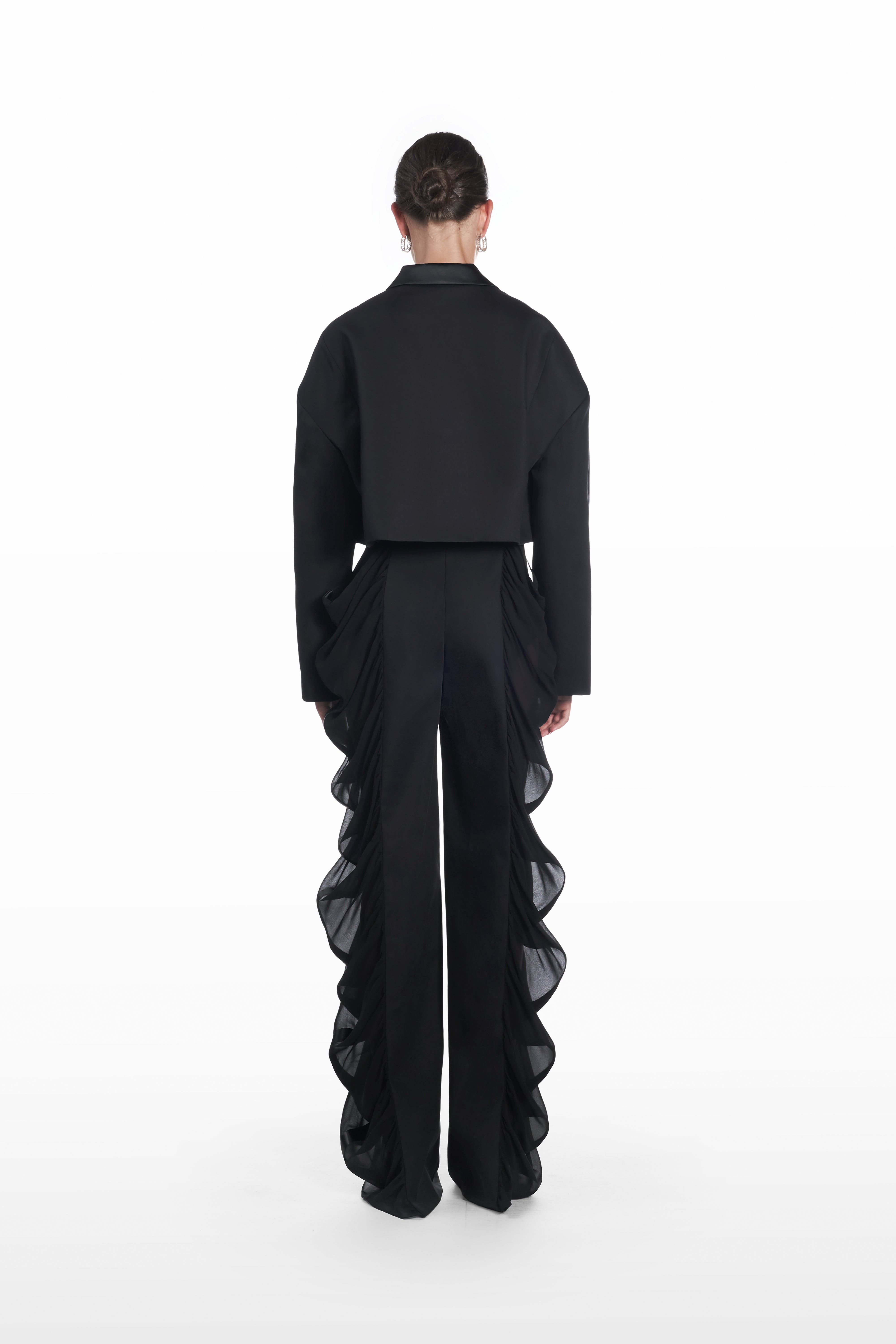 Falling Shoulders Crop Jacket in black, back view with falling-shoulder construction and refined architectural shape
