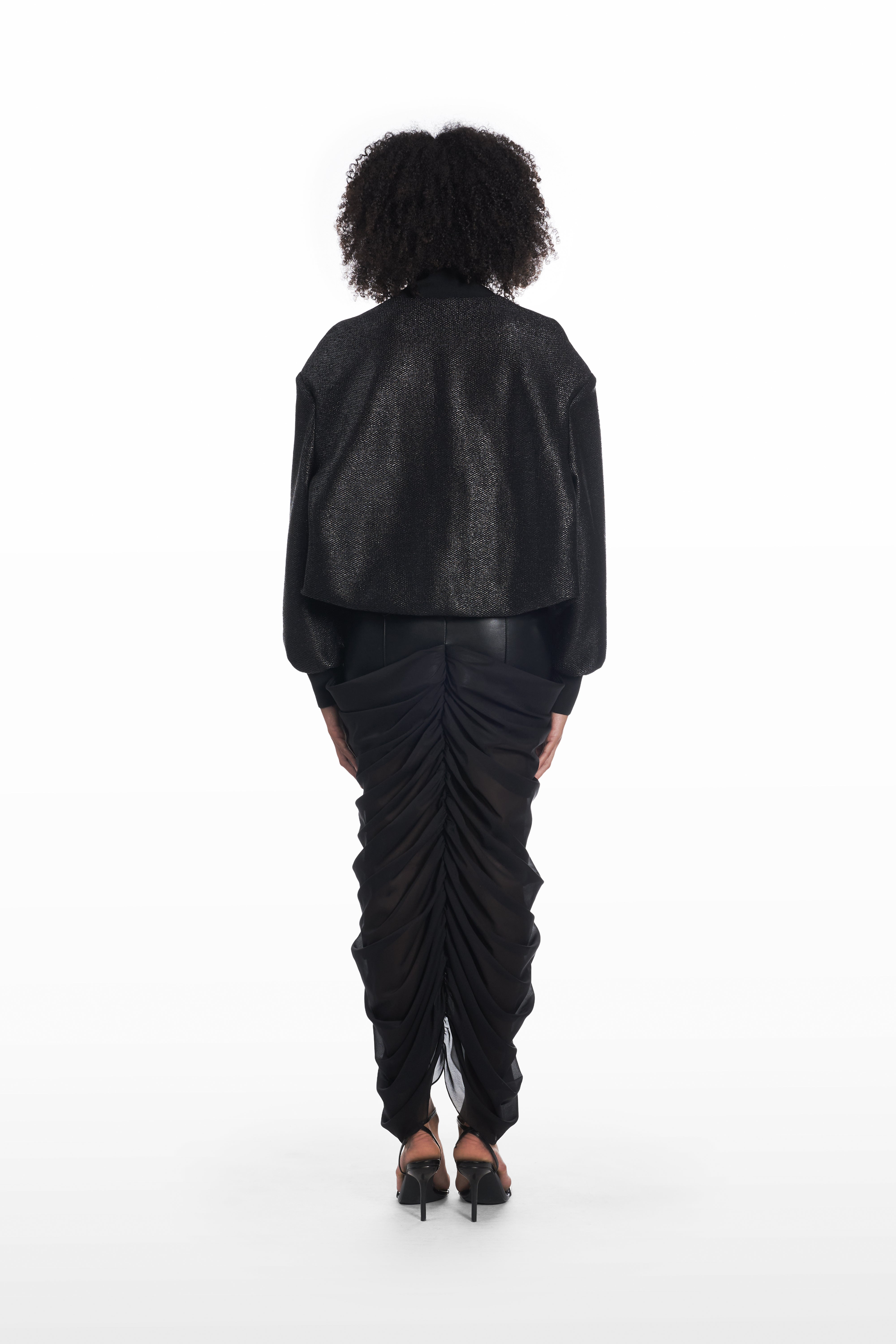 Oversize Raffia Bomber in black, back view with relaxed shape and structured bomber silhouette