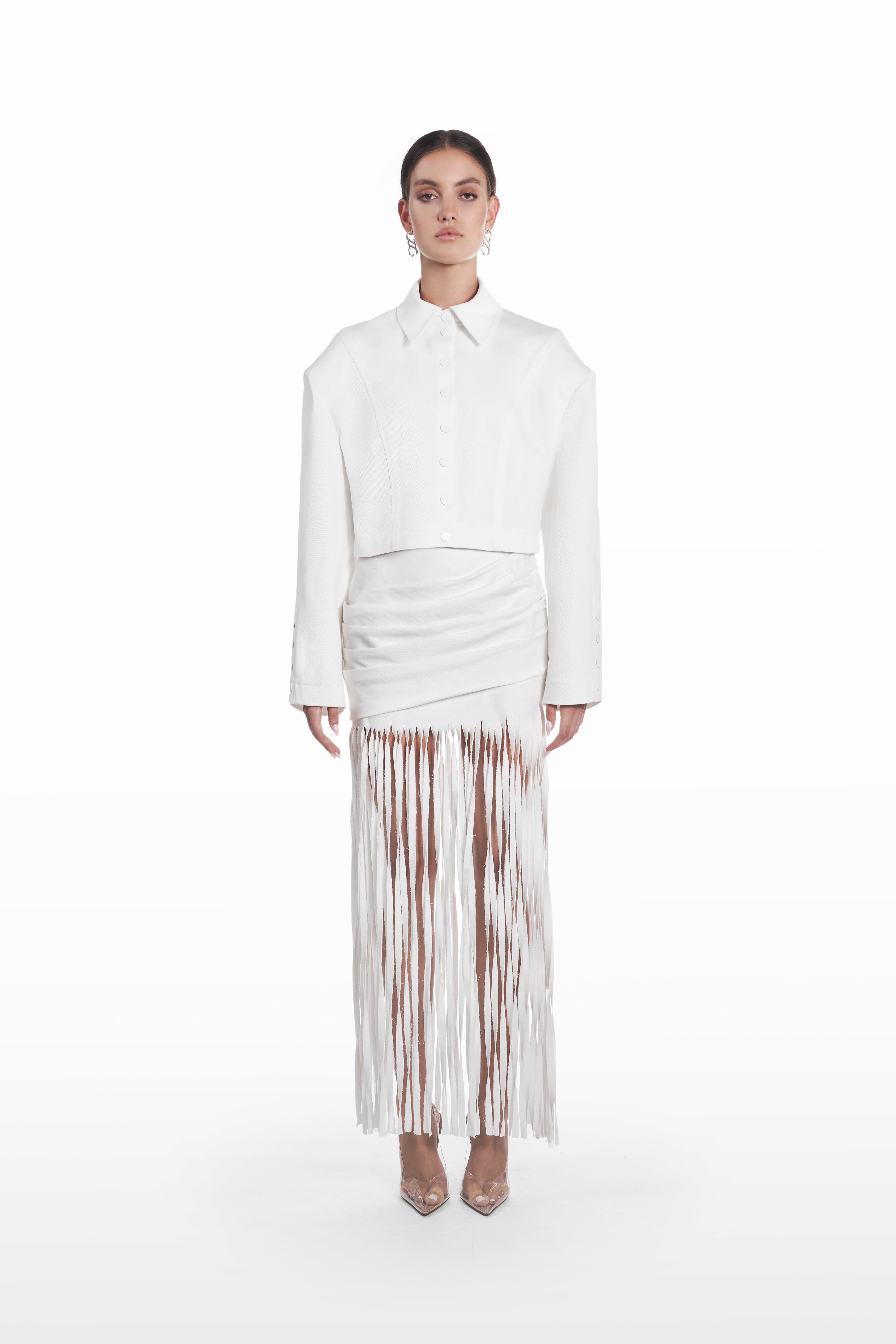 Palla Fringe Skirt in white, front view with draped waist and long fringe hem