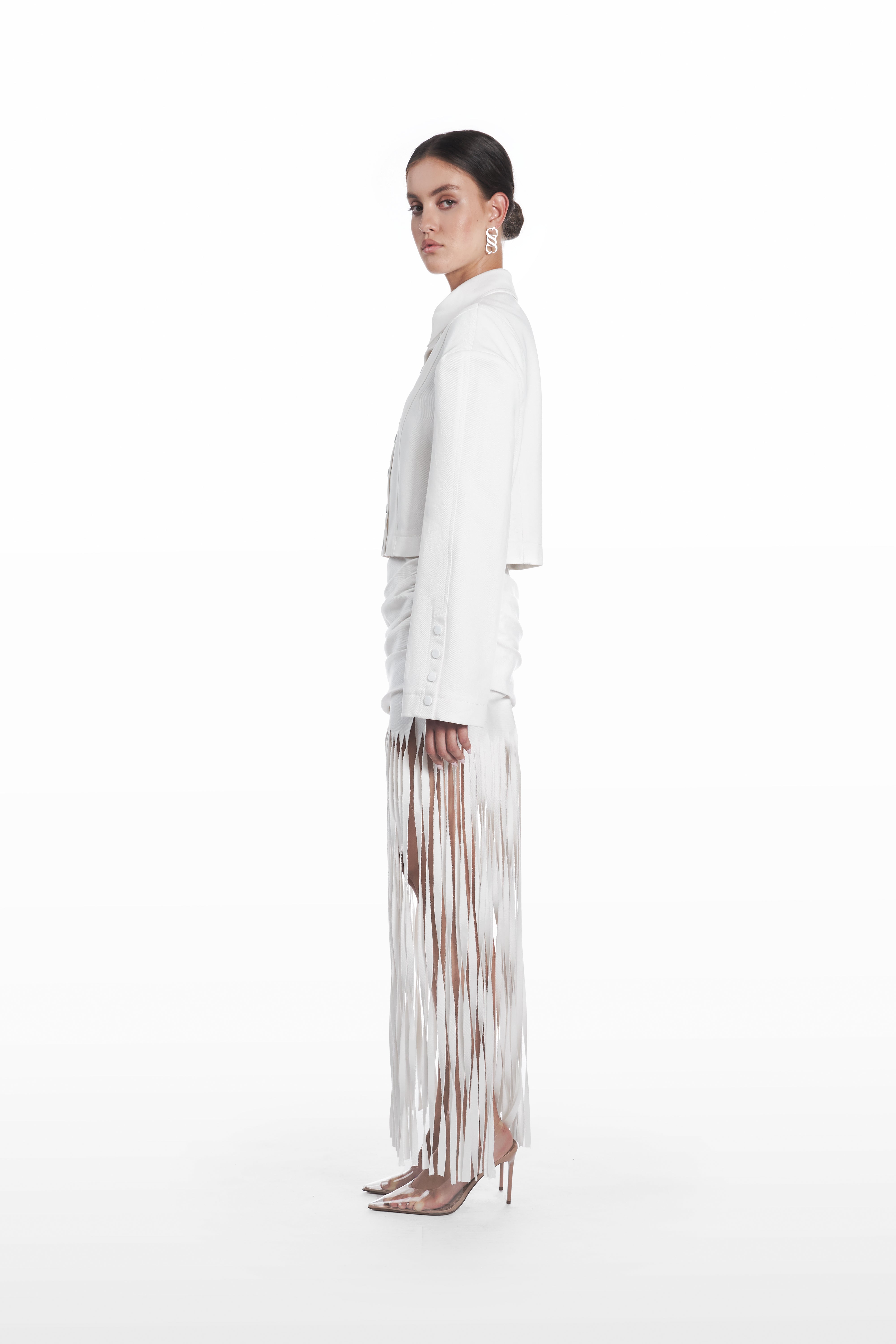 Oversize Falling Shoulders Shirt in white cotton blend, side view with elongated tailored line, sculpted sleeve structure, and relaxed falling-shoulder fit