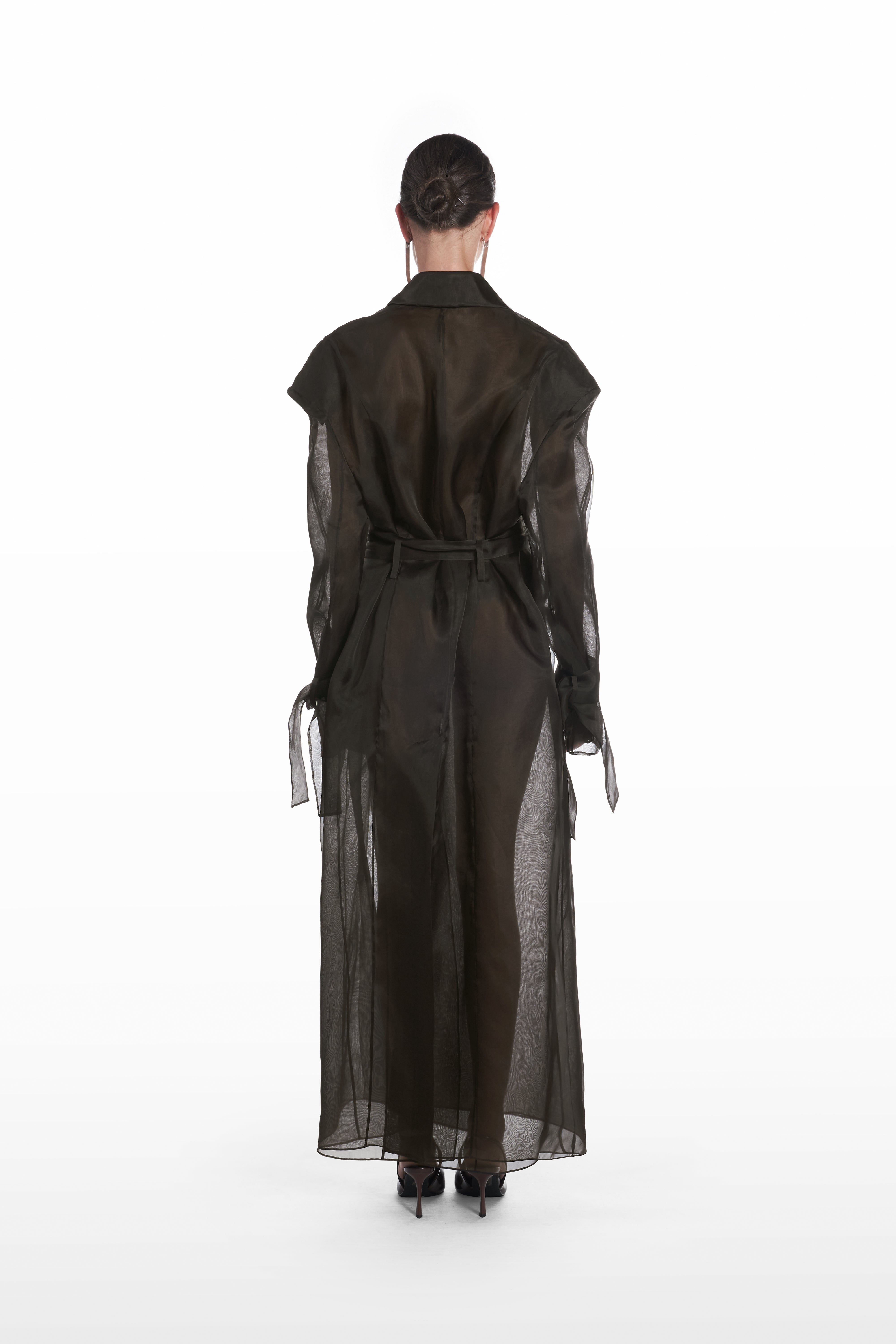 Classic double organza trench in black, back view with sheer silk organza construction and long belted shape