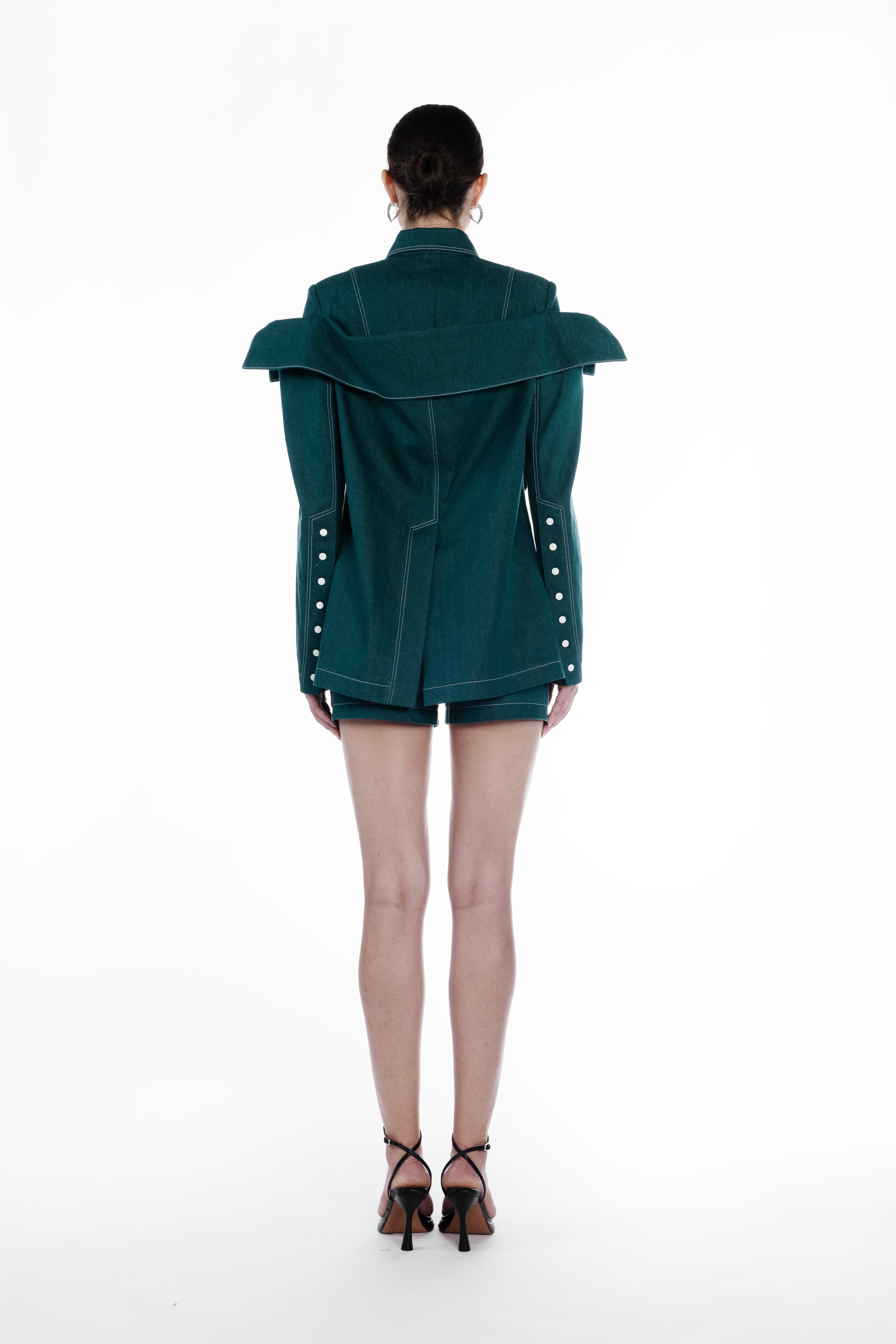 Short Falling Jacket in emerald green cotton, back view, sculptural falling shoulders and tailored longline shape