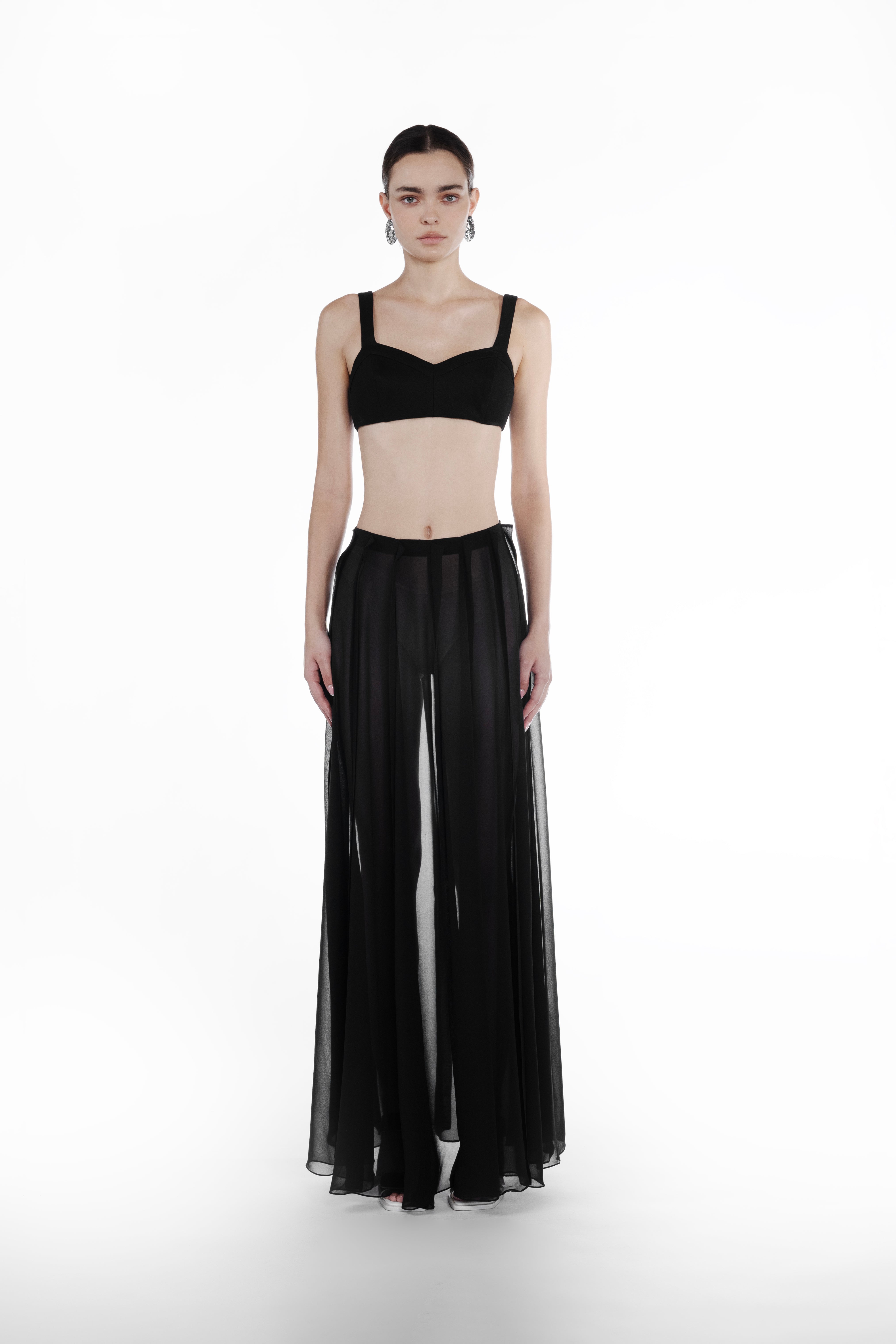 ong Plank Silk Skirt in Black, front view, sheer floor-length silk skirt with elongated plank layers and fluid transparent drape
