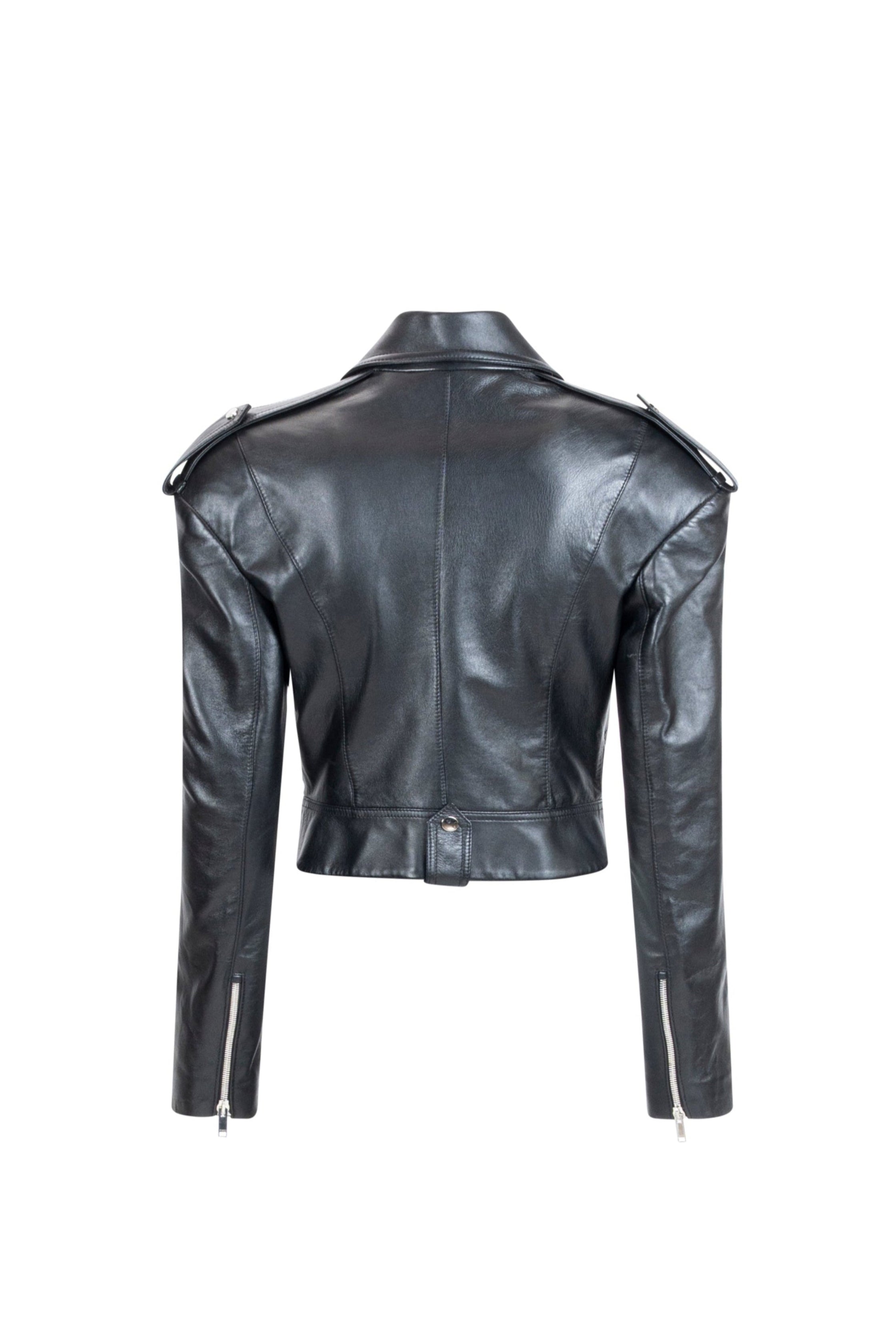 Cropped black leather jacket showing epaulettes, tailored seams and waist tab.