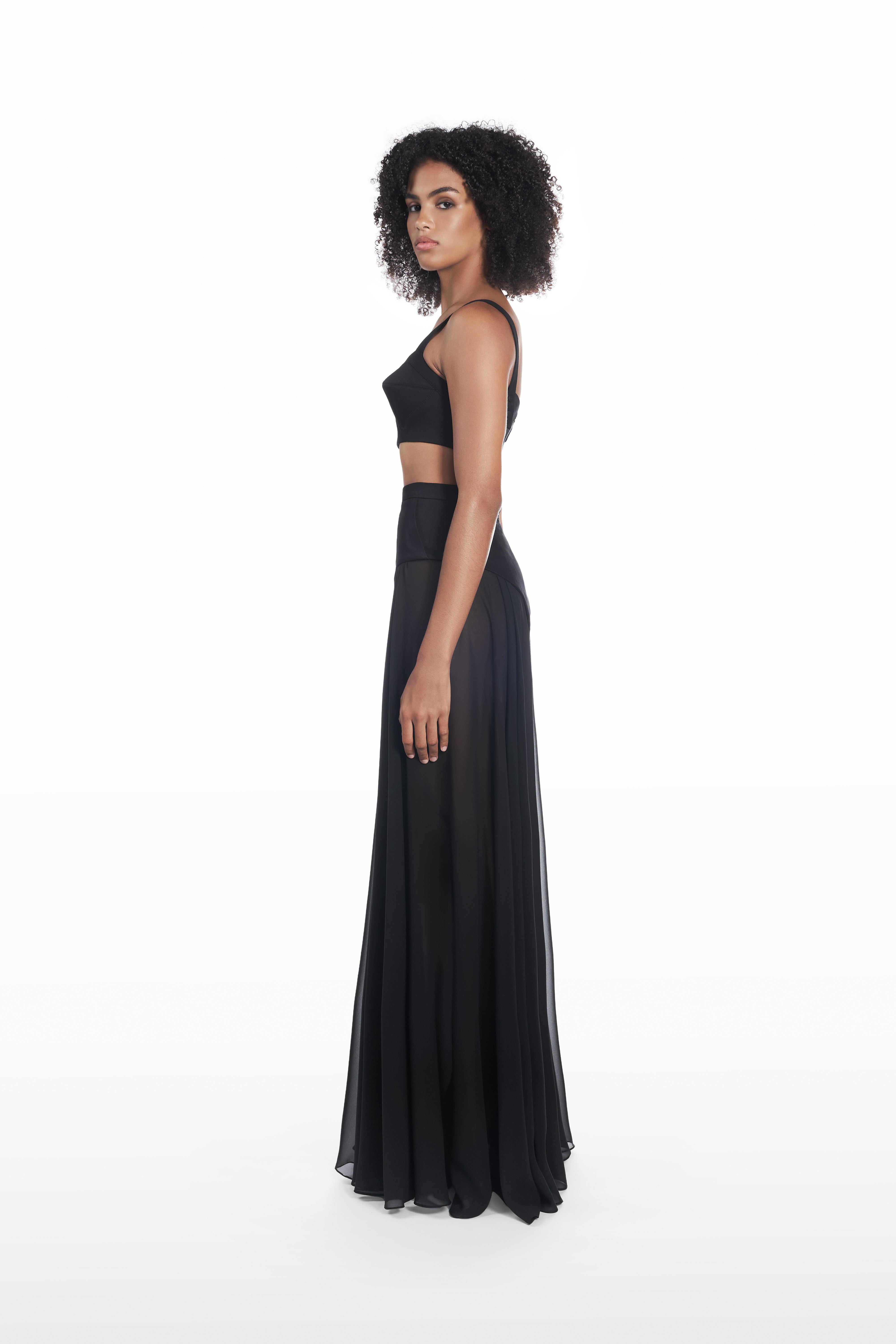 Long Underwear Application Skirt in black, side view with transparent silk drape and elongated line