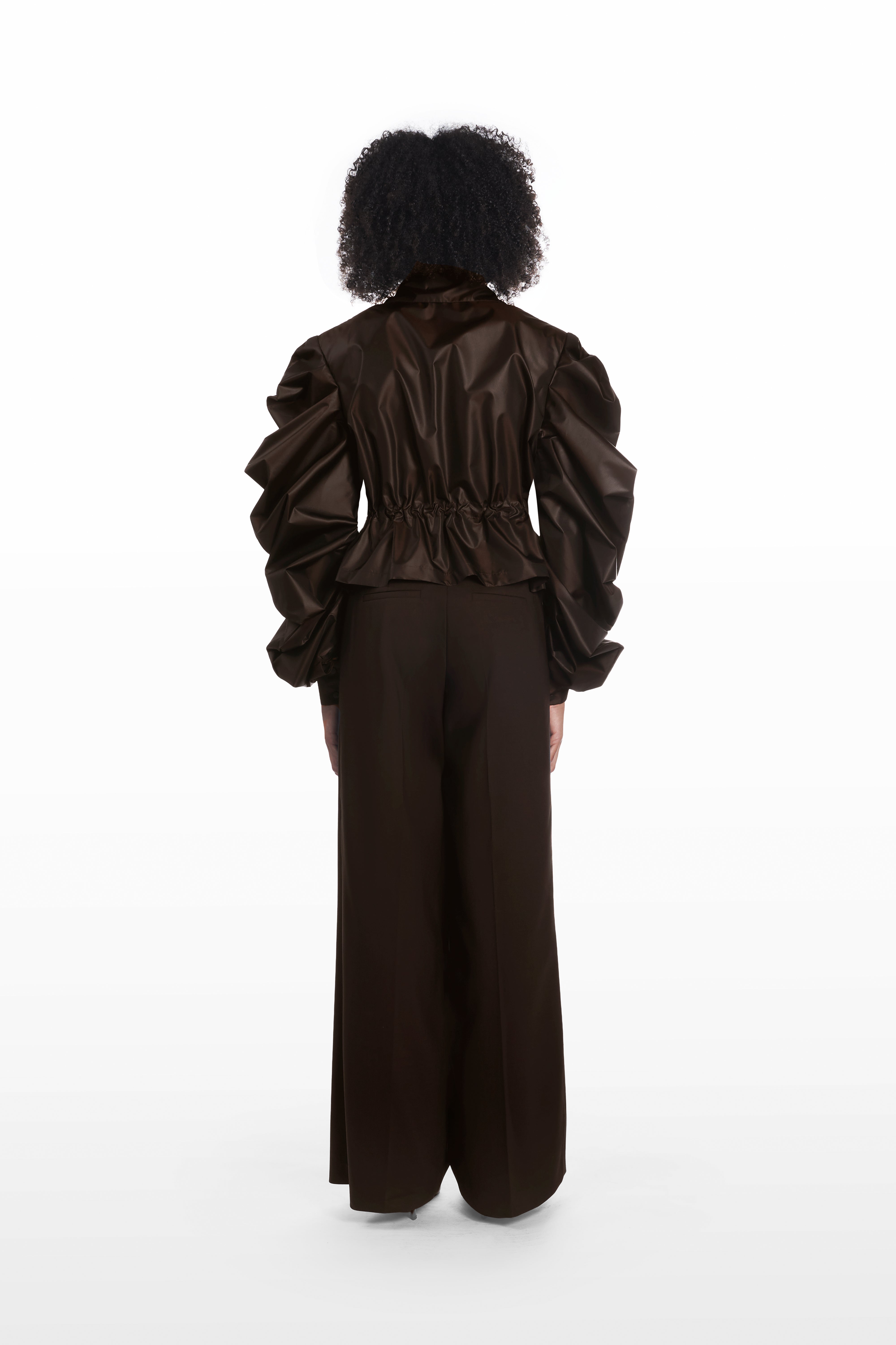 Medusa Silk Parka in dark brown, back view with cinched waist and structured silk silhouette