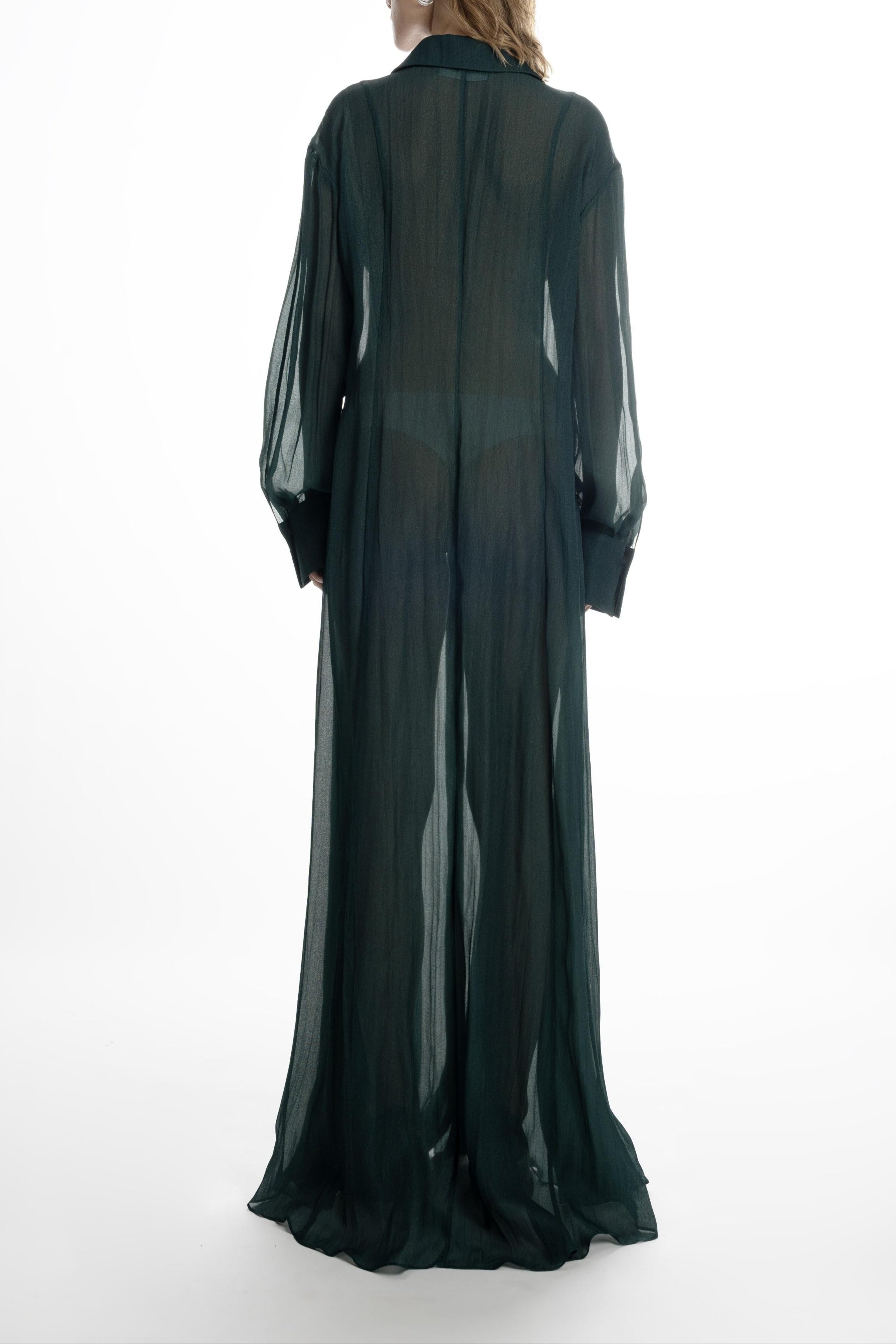 Deep green silk long shirt dress, maxi length with airy, semi-sheer finish. Back view