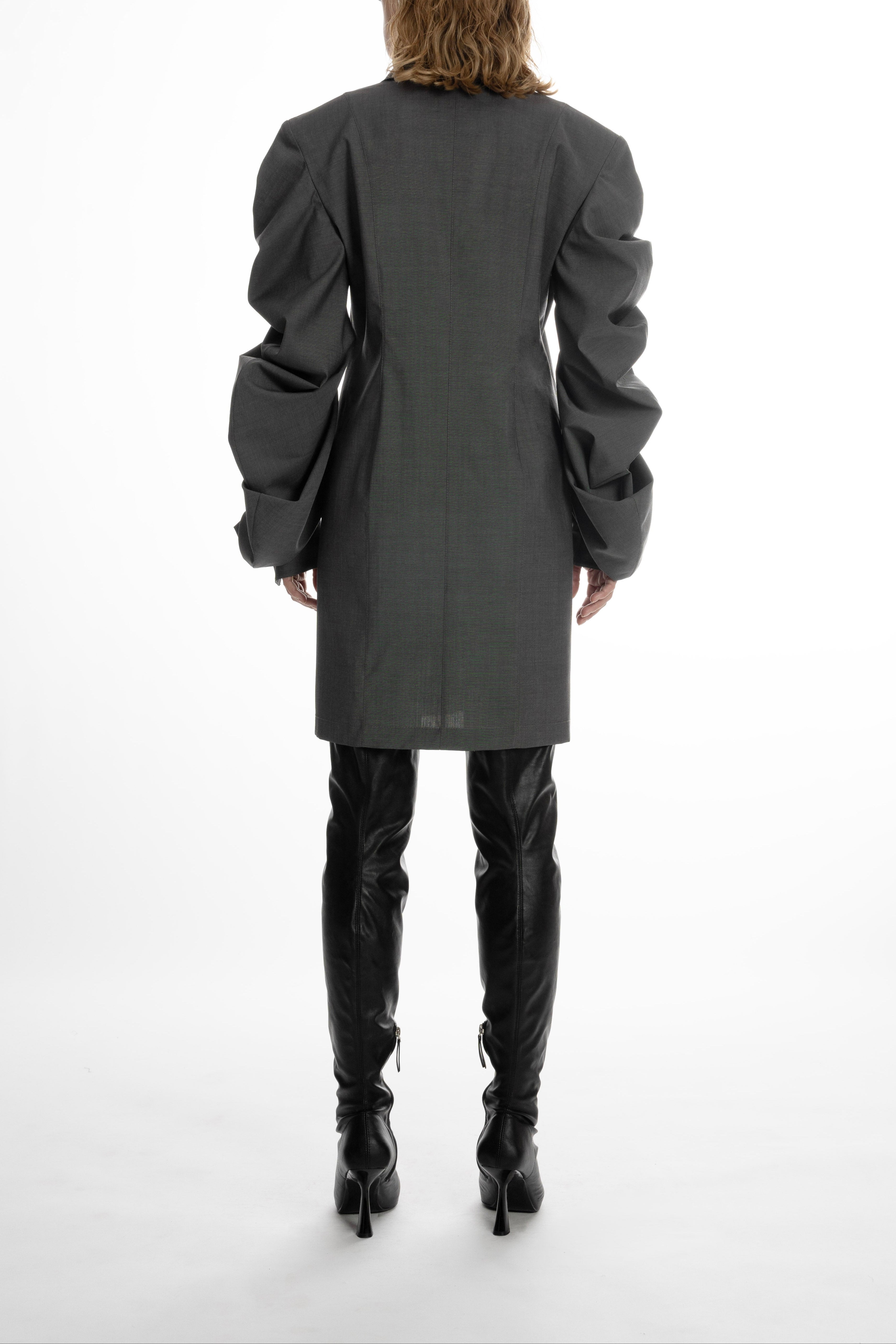 Women’s wool shirt with sculptural sleeves, clean back panel, back view
