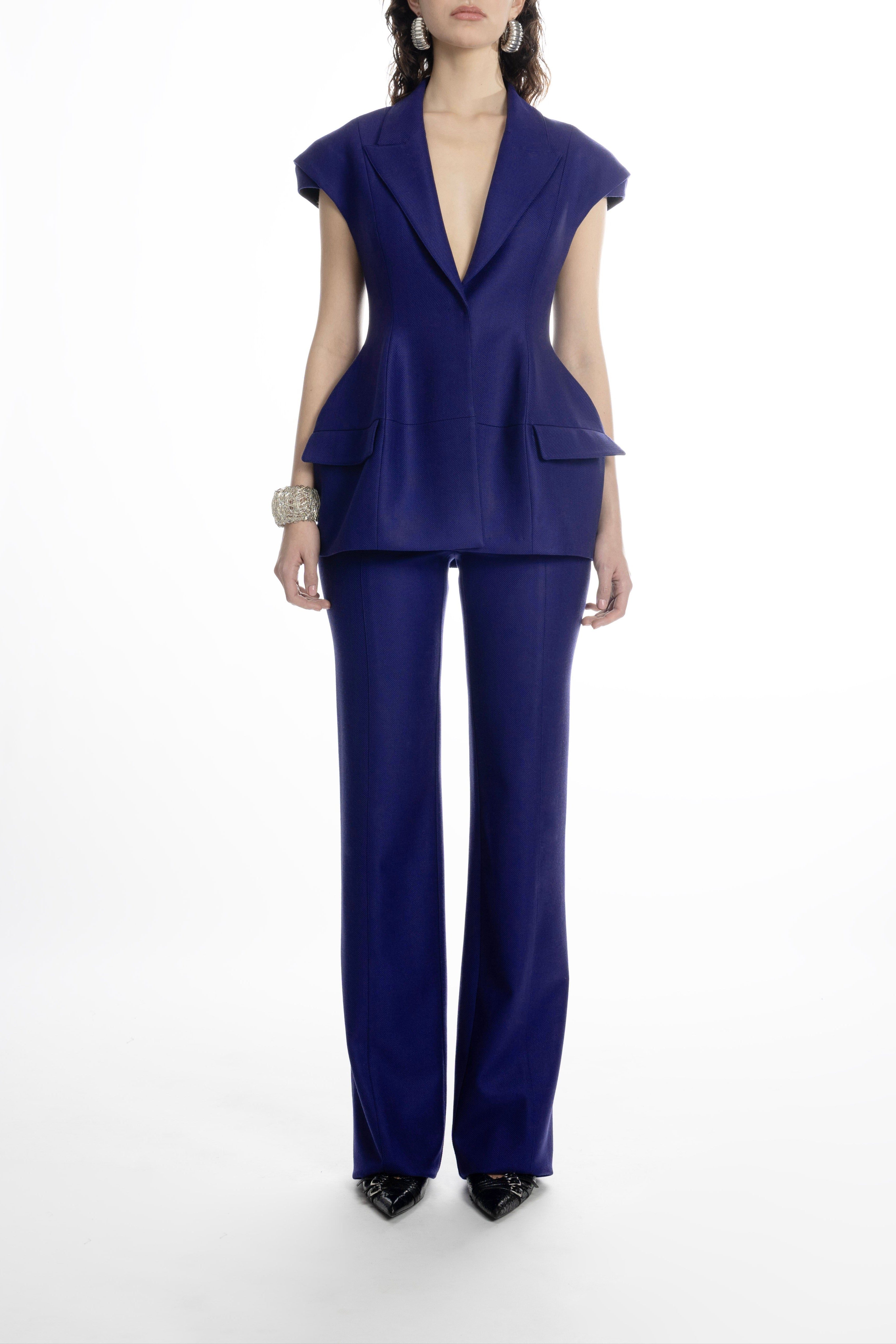 Women’s blue hip-length blazer with sharp lapels and cap sleeves