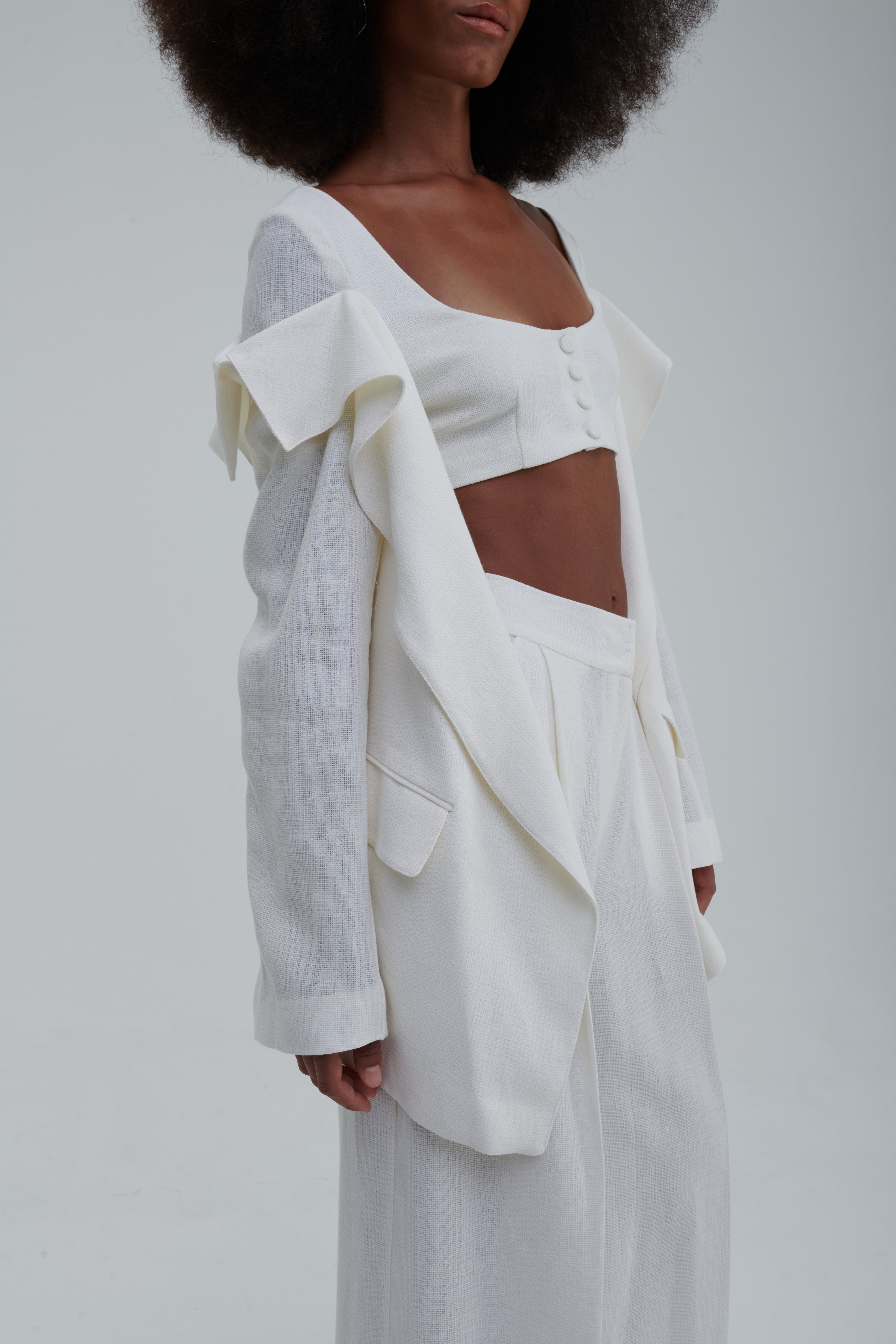 White textured linen-cotton, front detail with covered buttons