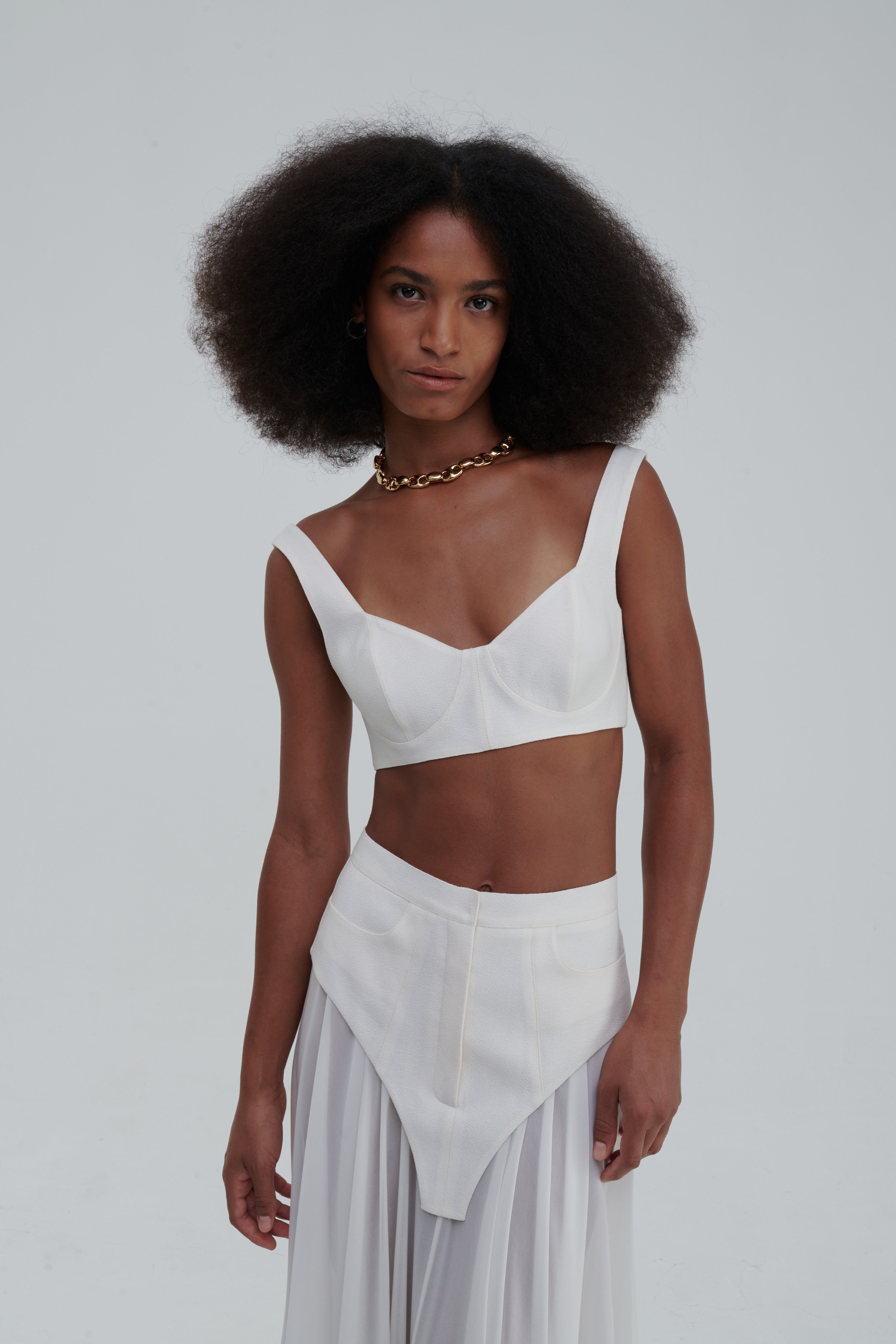 Silk bustier close-up, ivory, fabric texture and seam detail