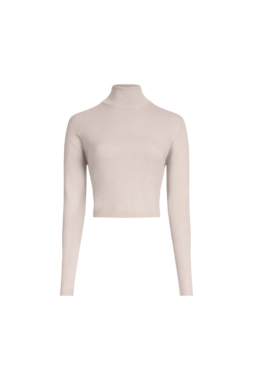 Beige cropped merino wool turtleneck sweater front view, fine rib knit and clean stand collar