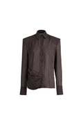 A dark brown long-sleeve button-up shirt with a unique gathered, ruched design on the lower front, displayed against a solid white background.