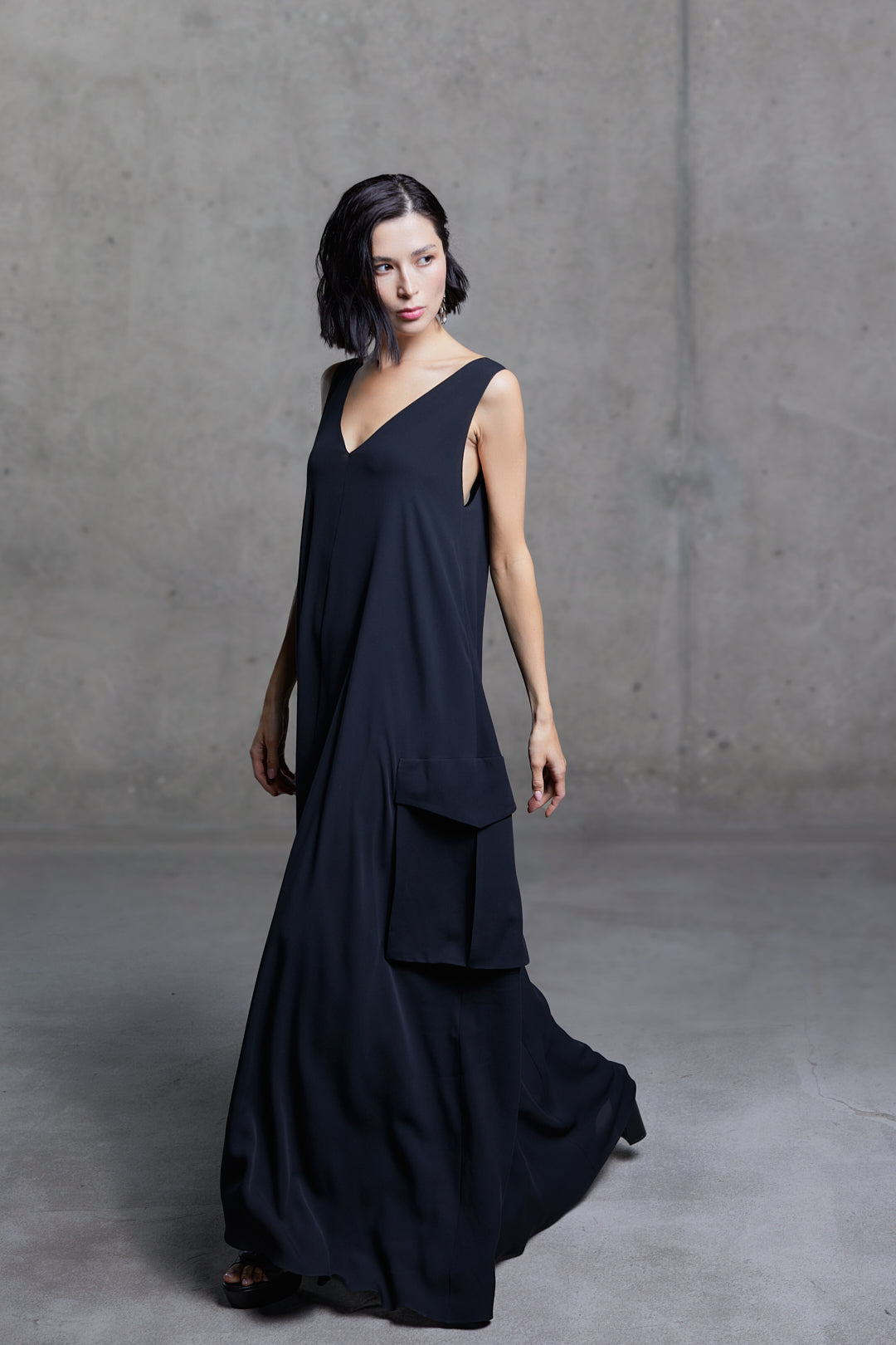 Black silk dress with cargo pockets