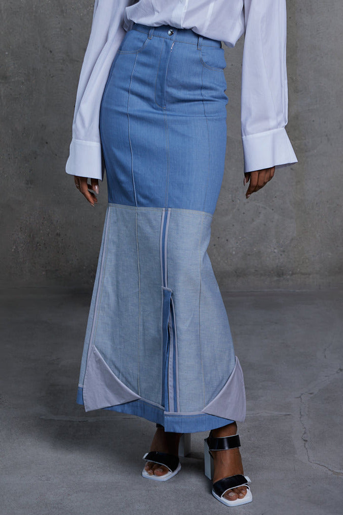 Denim dropped skirt, full front view, mermaid hem