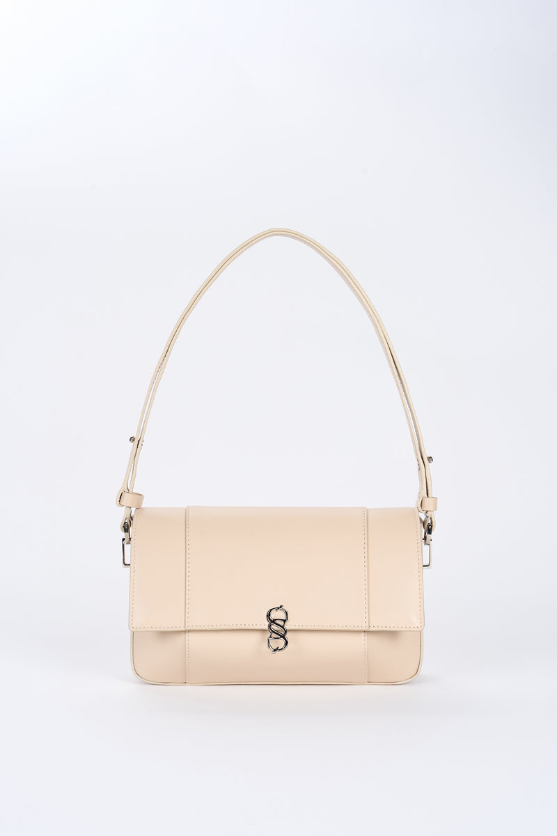 Beige Il Cupola leather bag front view with long shoulder strap and silver-tone logo hardware