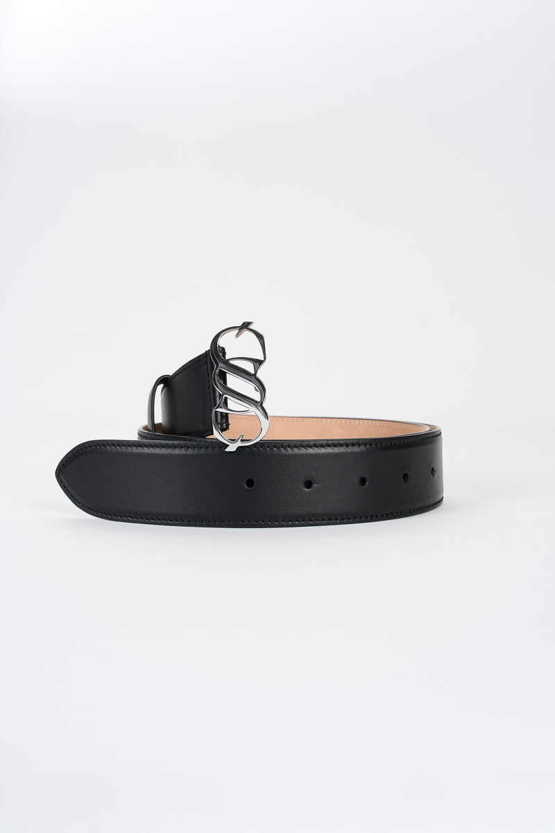 Black leather monogram belt with silver-tone buckle, angled view