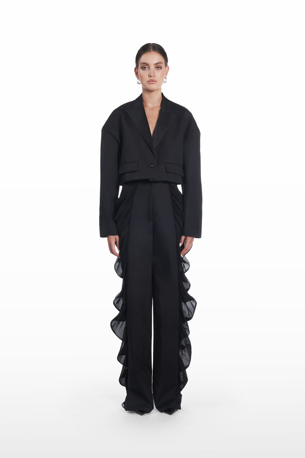 Falling Shoulders Crop Jacket in black, front view with cropped silhouette and sculptural dropped shoulders