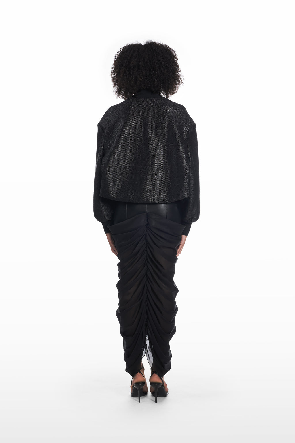 Oversize Raffia Bomber in black, back view with relaxed shape and structured bomber silhouette