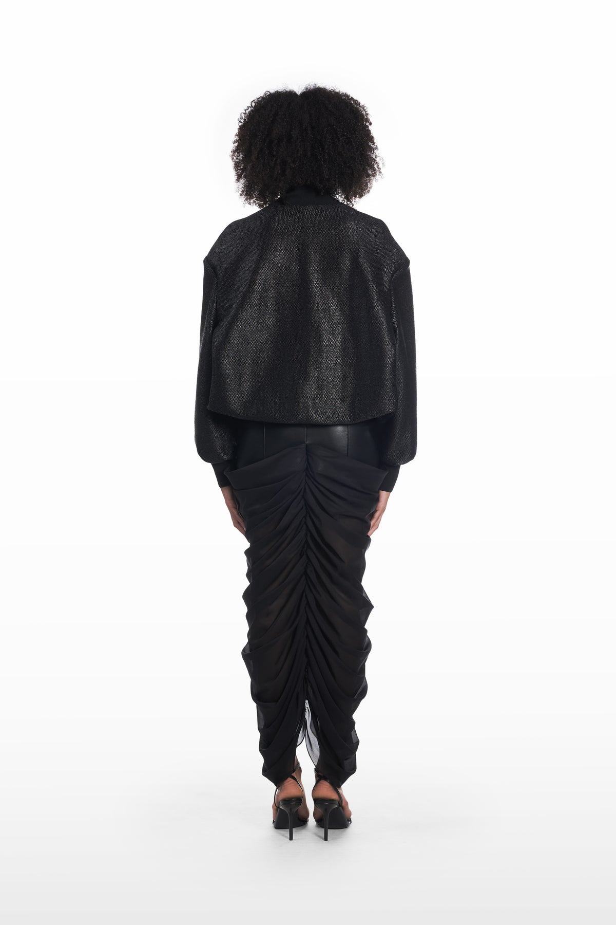 Oversize Raffia Bomber in black, back view with relaxed shape and structured bomber silhouette