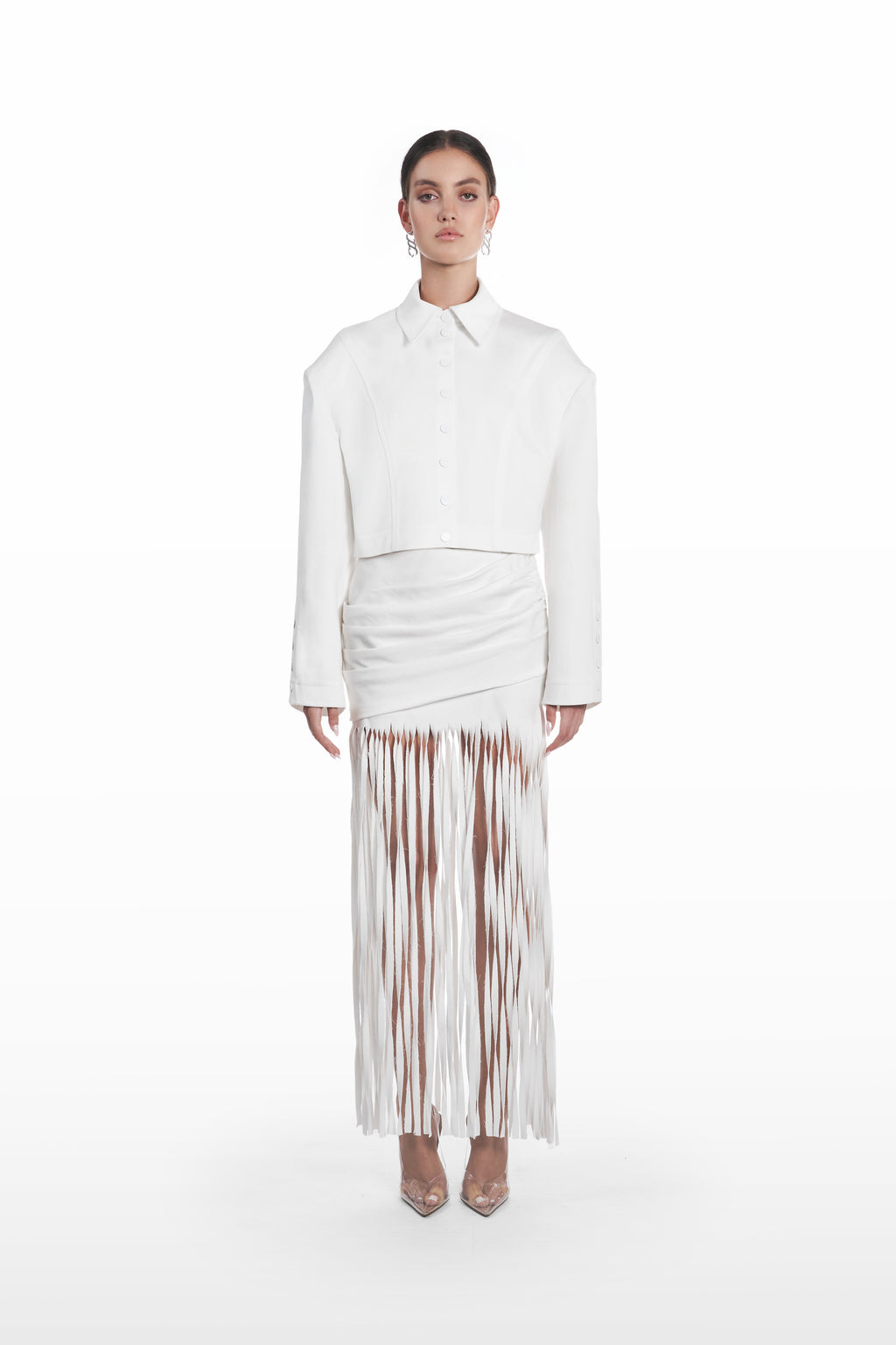 Palla Fringe Skirt in white, front view with draped waist and long fringe hem