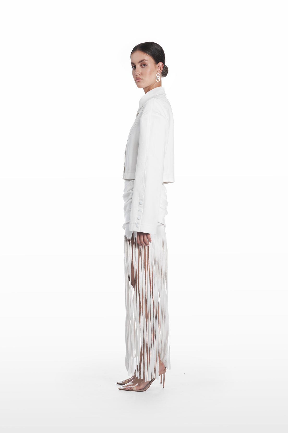 Oversize Falling Shoulders Shirt in white cotton blend, side view with elongated tailored line, sculpted sleeve structure, and relaxed falling-shoulder fit