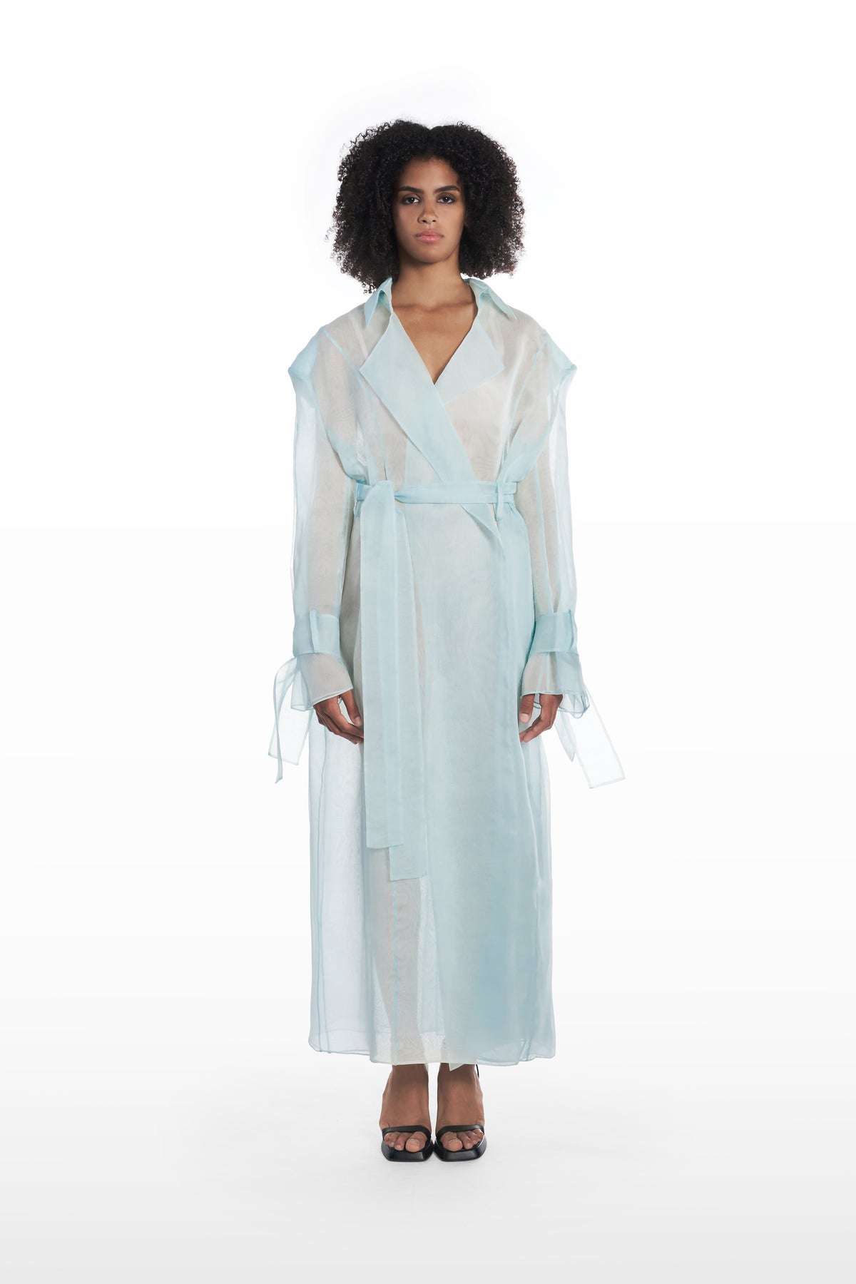 Classic double organza trench in clear aqua, front view with belted waist and sheer full-length silhouette