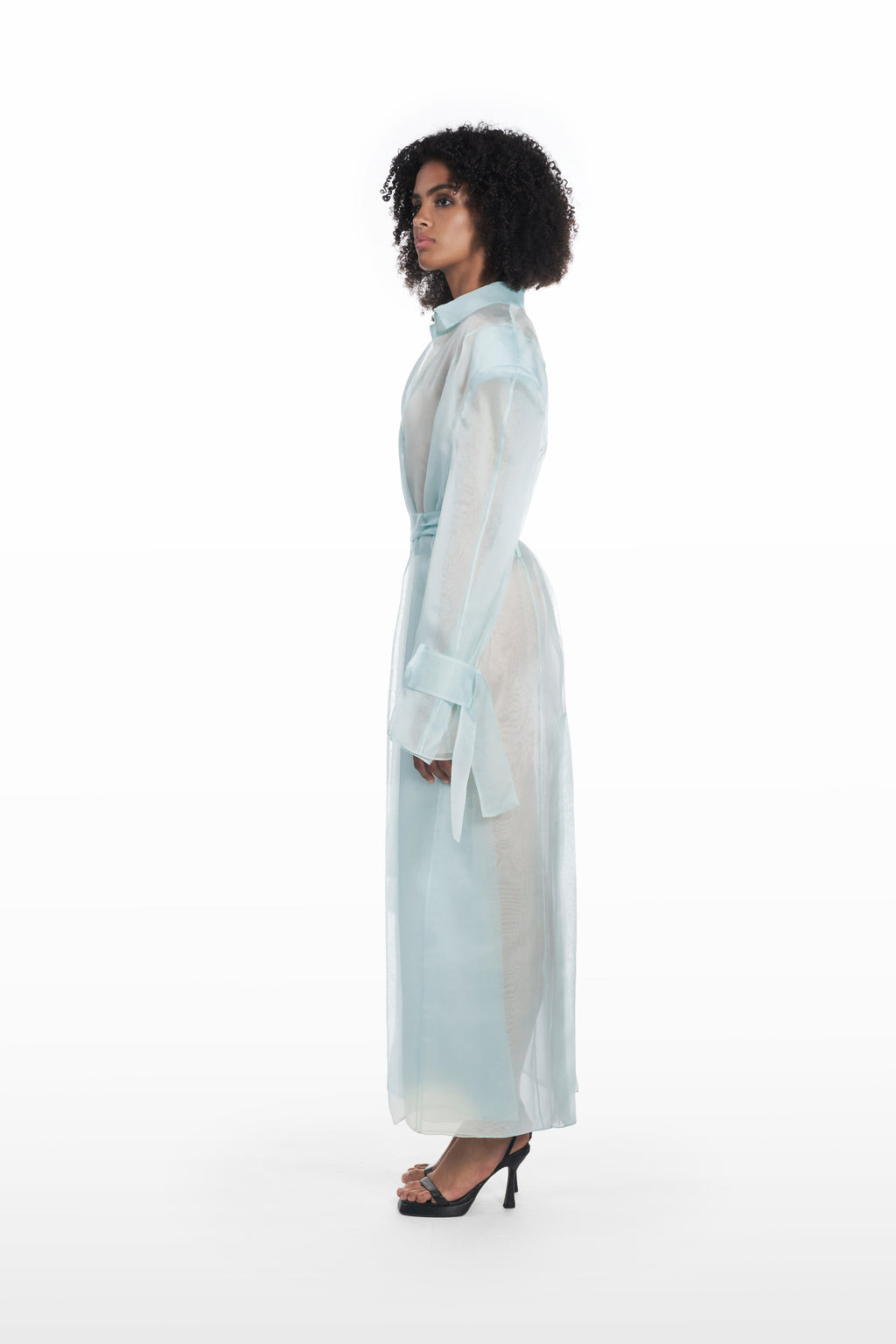 Classic double organza trench in clear aqua, side view with fluid transparent silhouette and tied cuffs