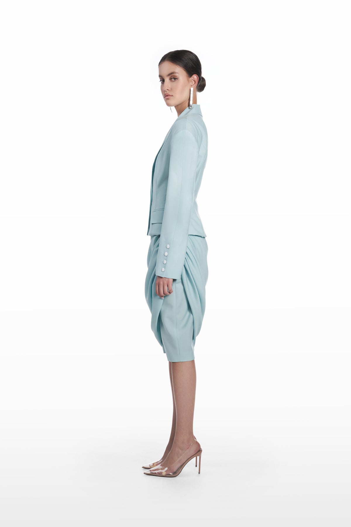 Pencil Palla Skirt in clear aqua, side view with soft draped construction and fitted shape