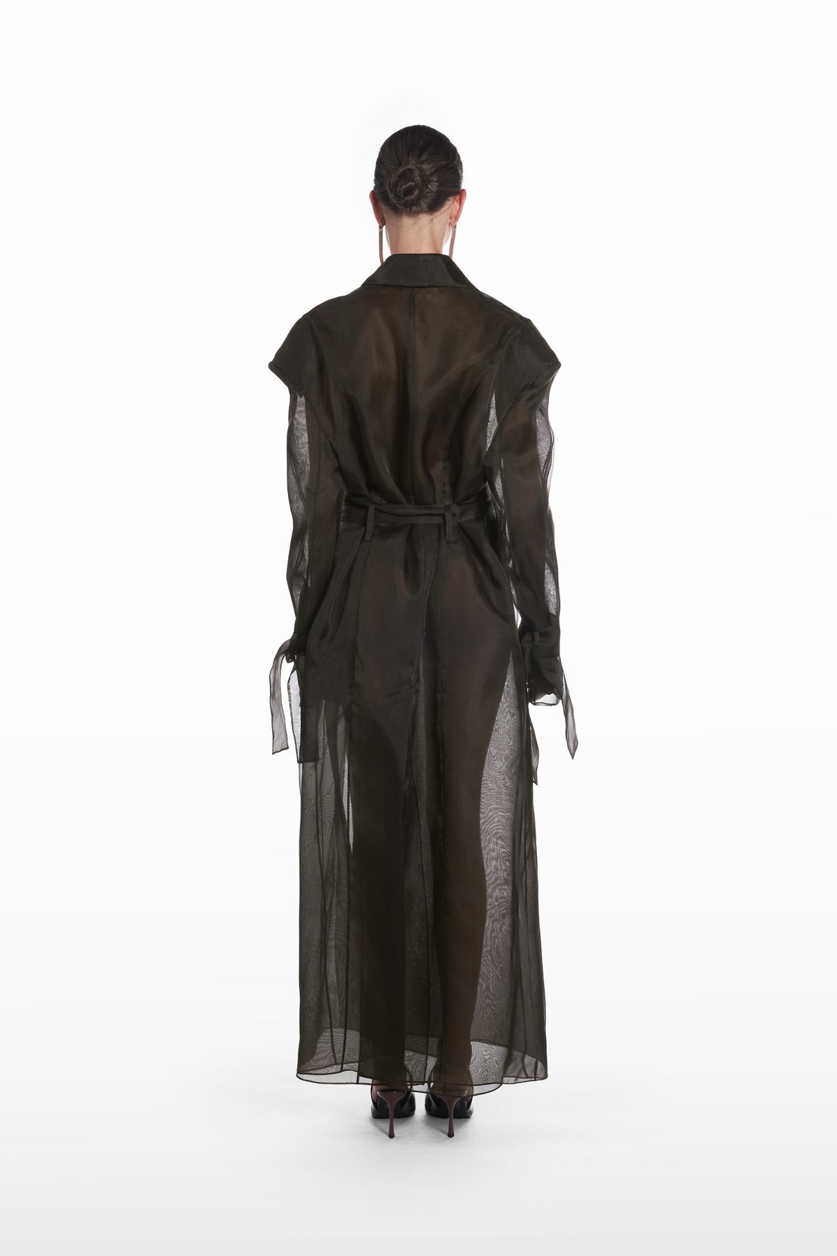 Classic double organza trench in black, back view with sheer silk organza construction and long belted shape