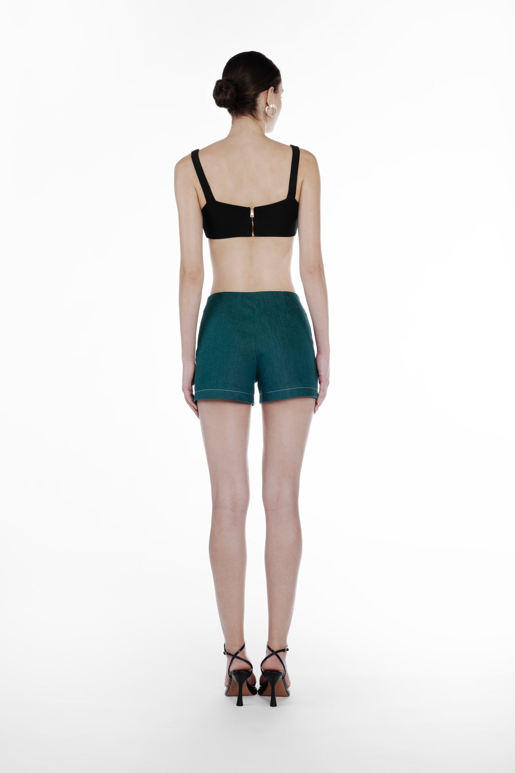 Mini Slits Shorts in Emerald Green, back view, tailored cotton mini shorts with clean rear construction, contrast stitching and refined minimal cut