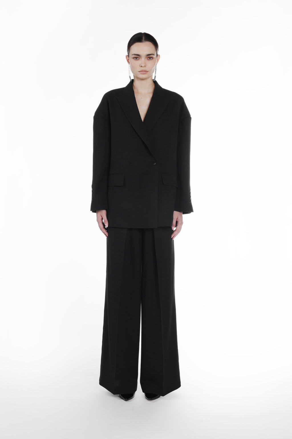 Falling Shoulder Double-Breasted Jacket black front view with wide-leg trousers and dropped shoulder tailoring
