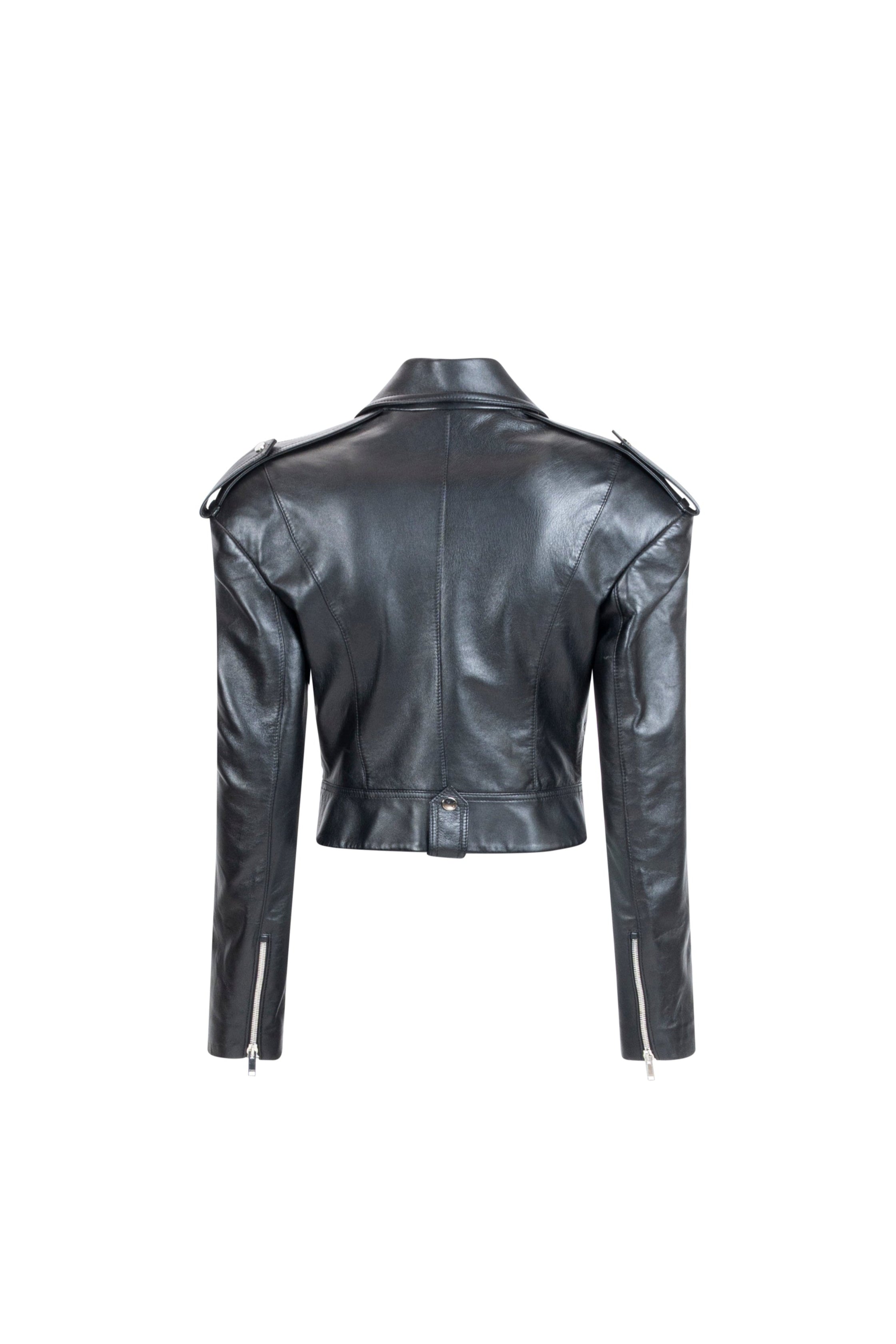 Cropped black leather jacket showing epaulettes, tailored seams and waist tab.