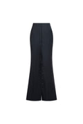 Long black wool skirt with high waist and placket.