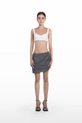 Falling Palla Stripes Skirt in dark grey pinstripe, front view, asymmetric low-rise mini silhouette