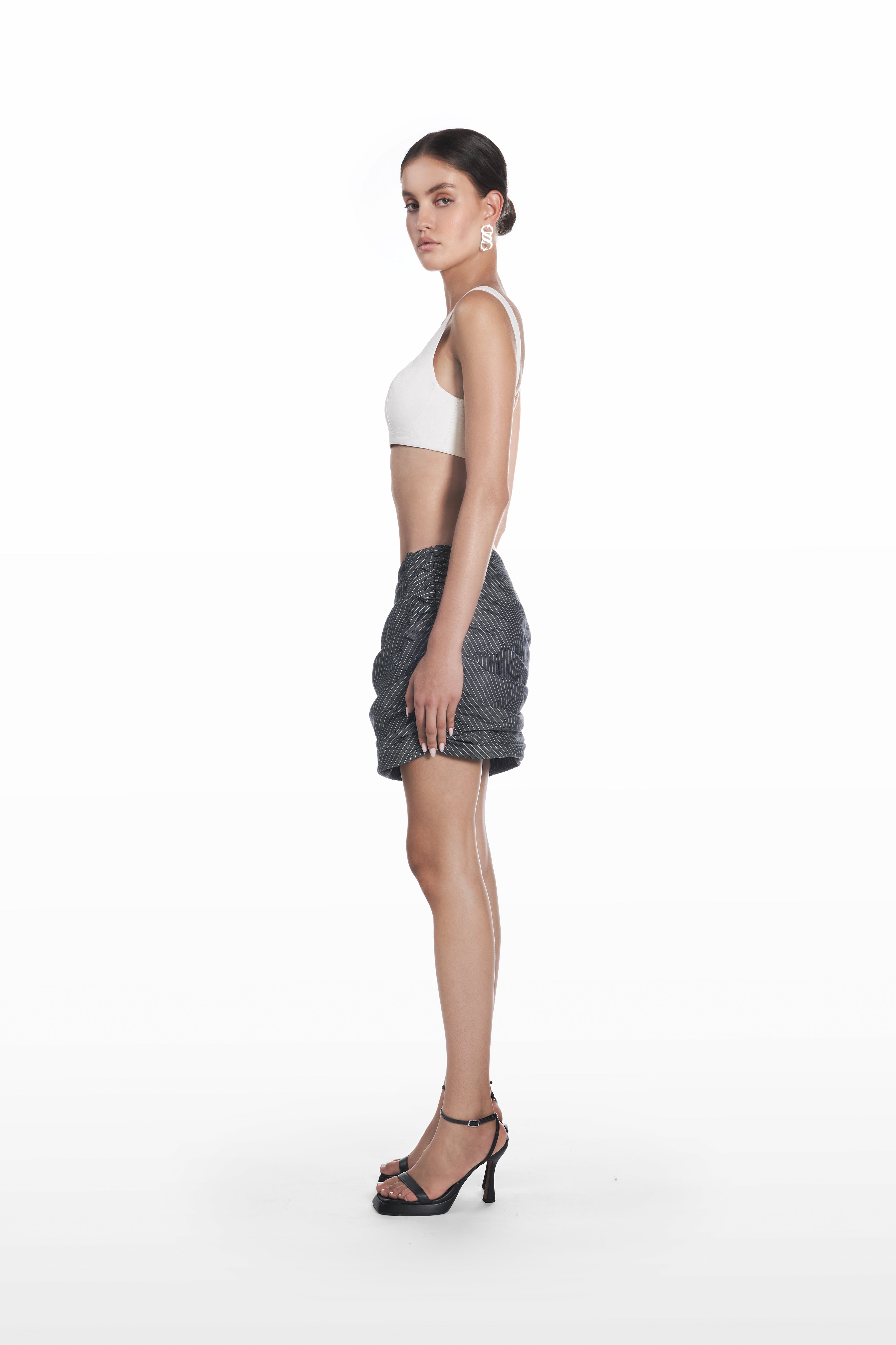 Falling Palla Stripes Skirt in dark grey pinstripe, side view, gathered draped mini shape