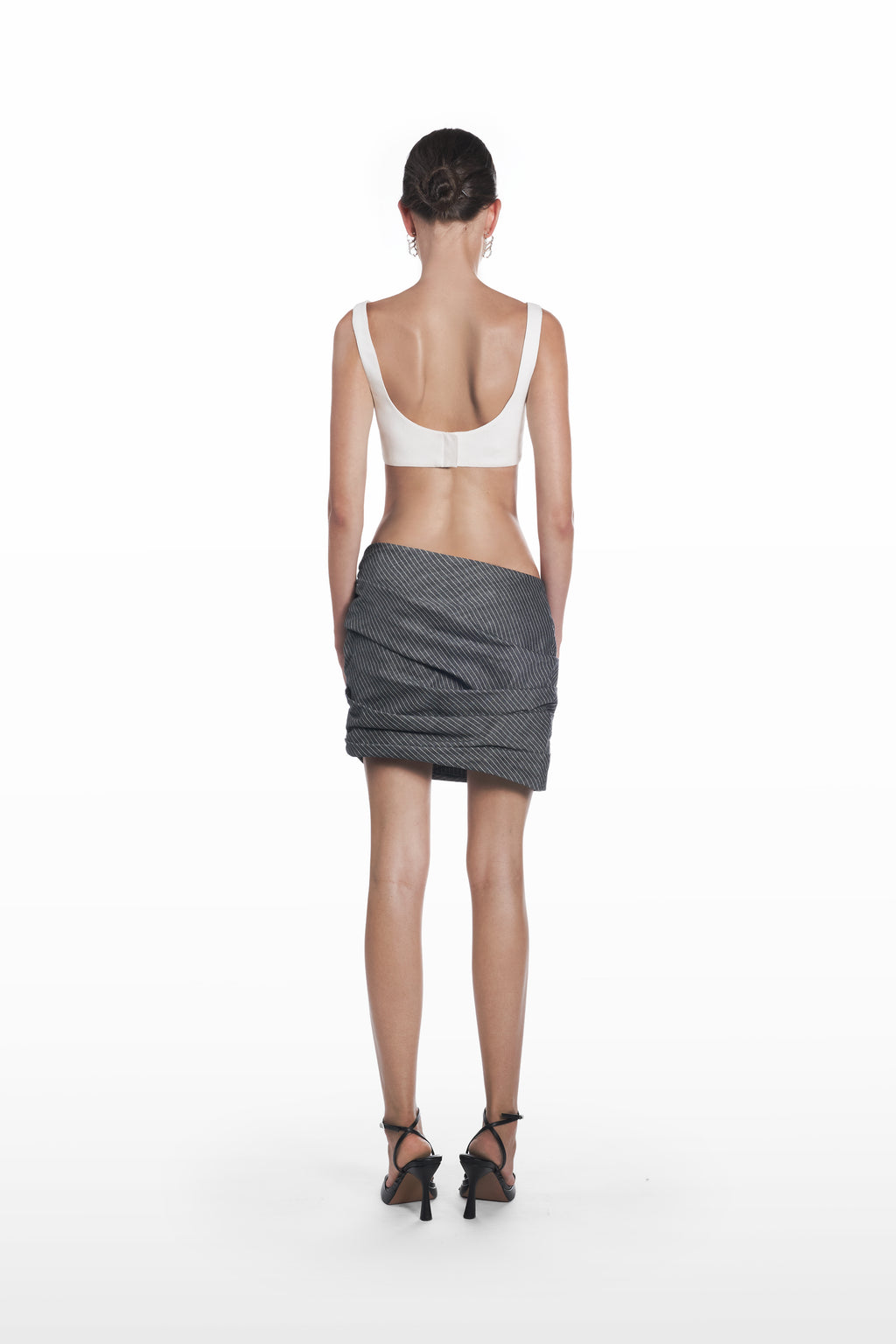 Falling Palla Stripes Skirt in dark grey pinstripe, back view, sculptural mini silhouette with soft drape
