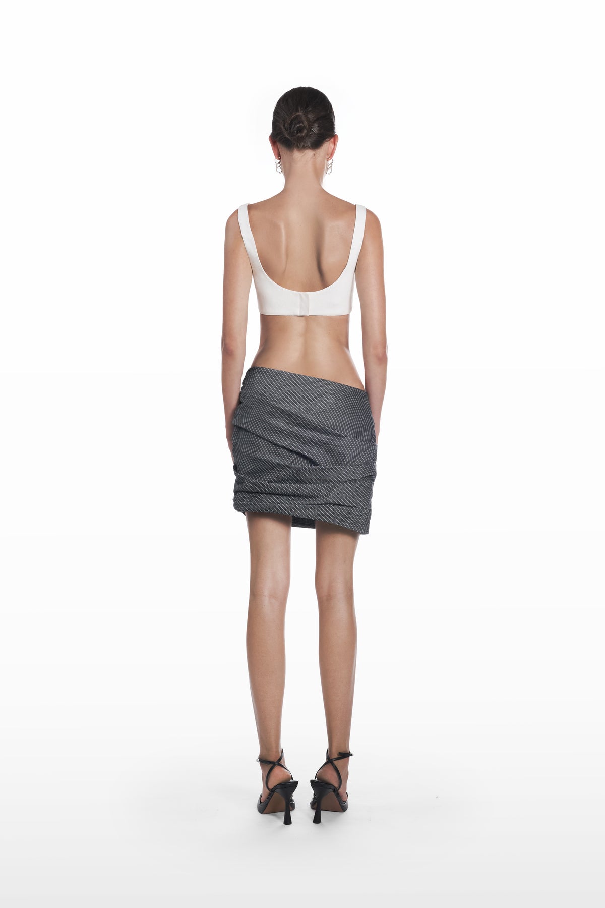 Falling Palla Stripes Skirt in dark grey pinstripe, back view, sculptural mini silhouette with soft drape