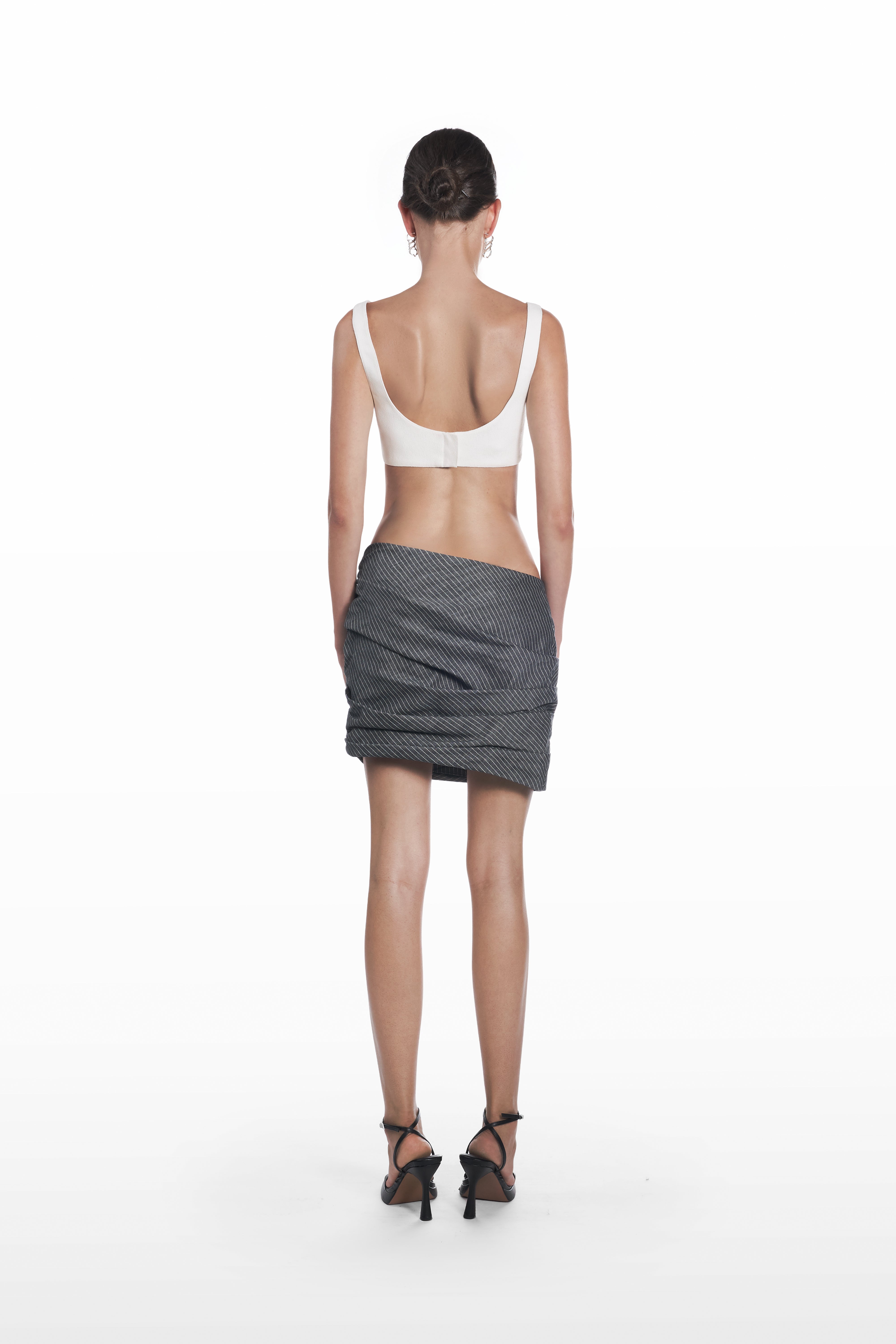 Falling Palla Stripes Skirt in dark grey pinstripe, back view, sculptural mini silhouette with soft drape