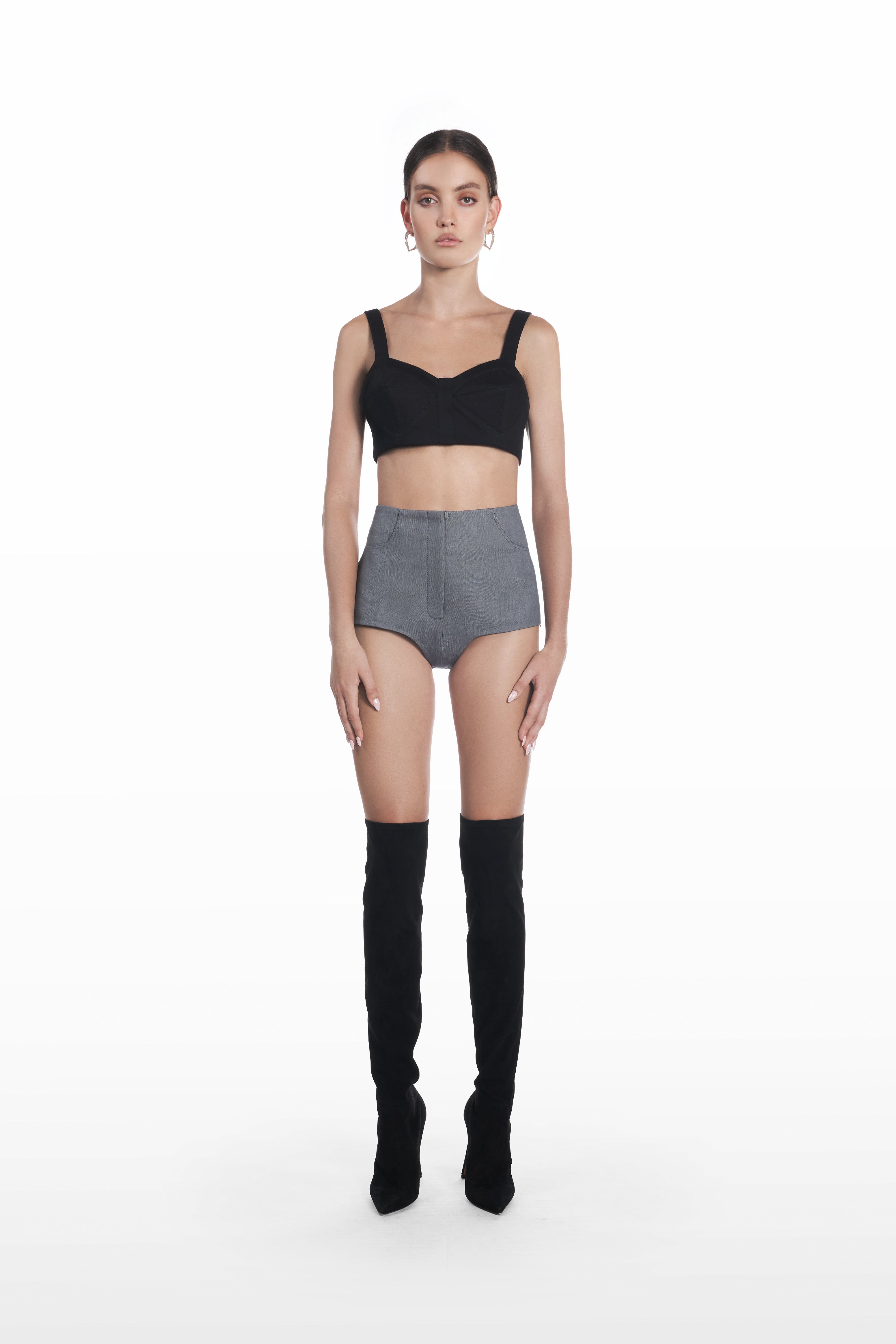 Underwear mini shorts in grey, front view with high-waisted sculpted silhouette styled with a black cropped top