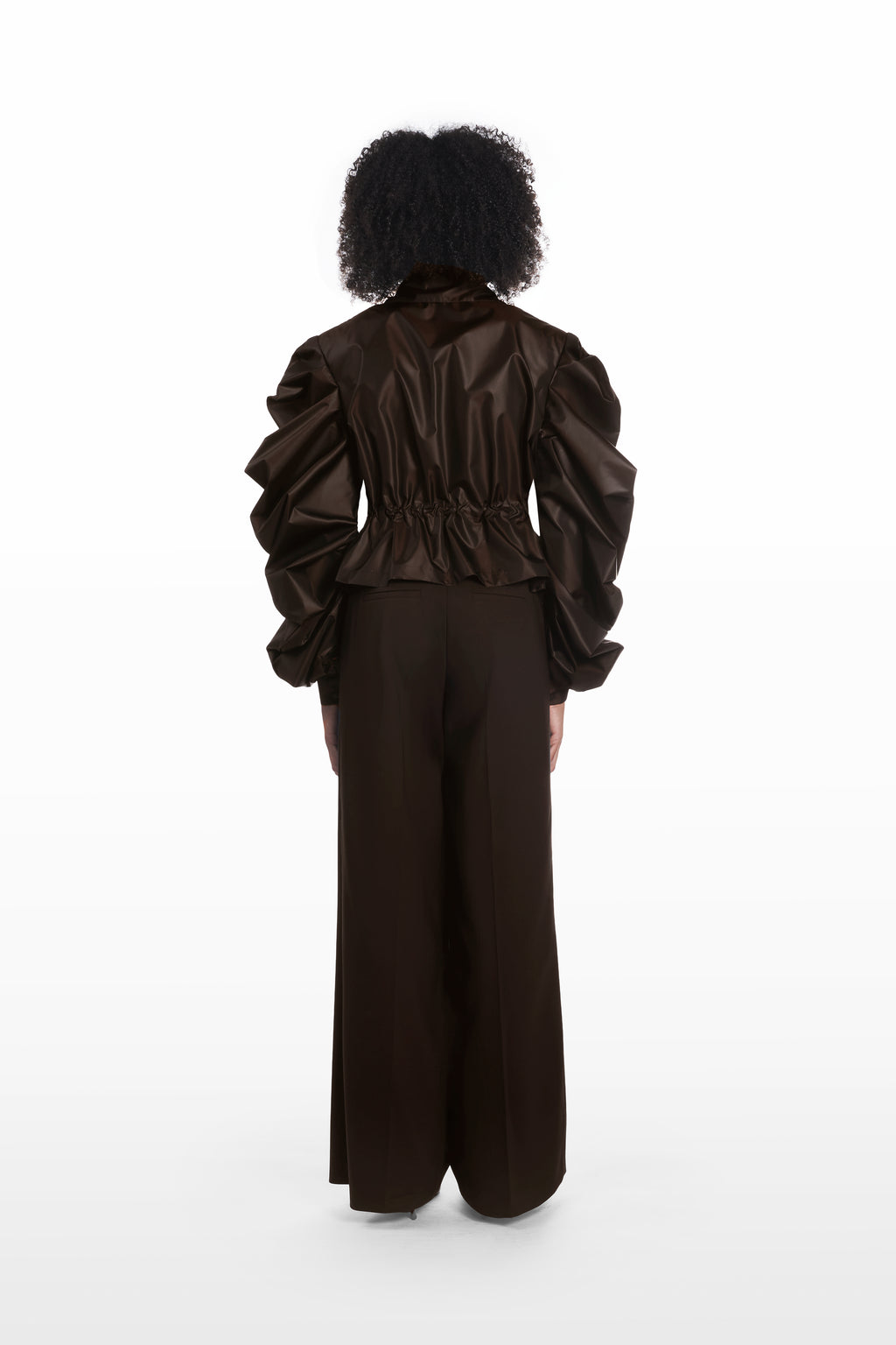 Medusa Silk Parka in dark brown, back view with cinched waist and structured silk silhouette