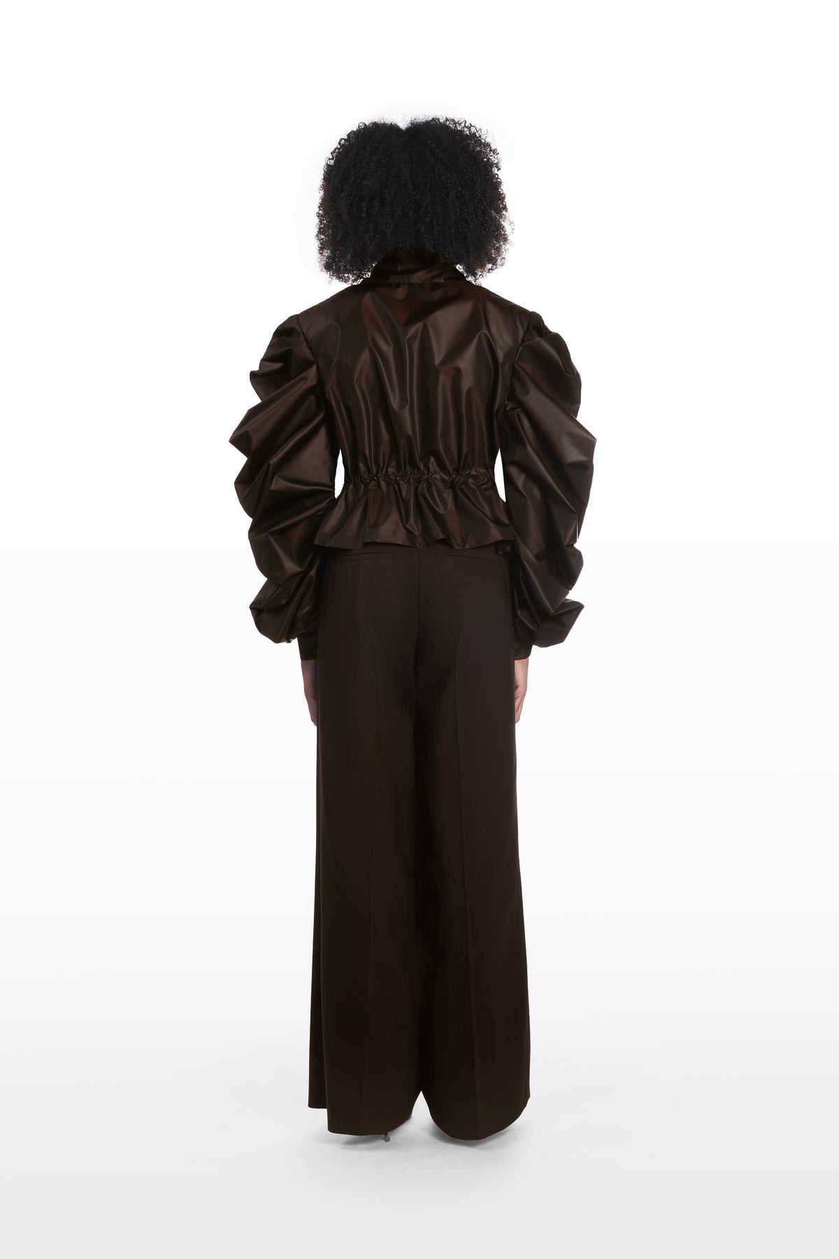 Medusa Silk Parka in dark brown, back view with cinched waist and structured silk silhouette