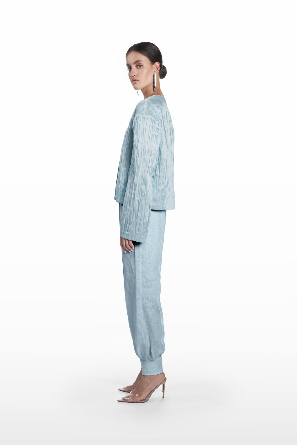 Oversize Crushed Organza Jacket in clear aqua silk organza, side view showing airy volume, fluid drape, and cropped architectural proportions