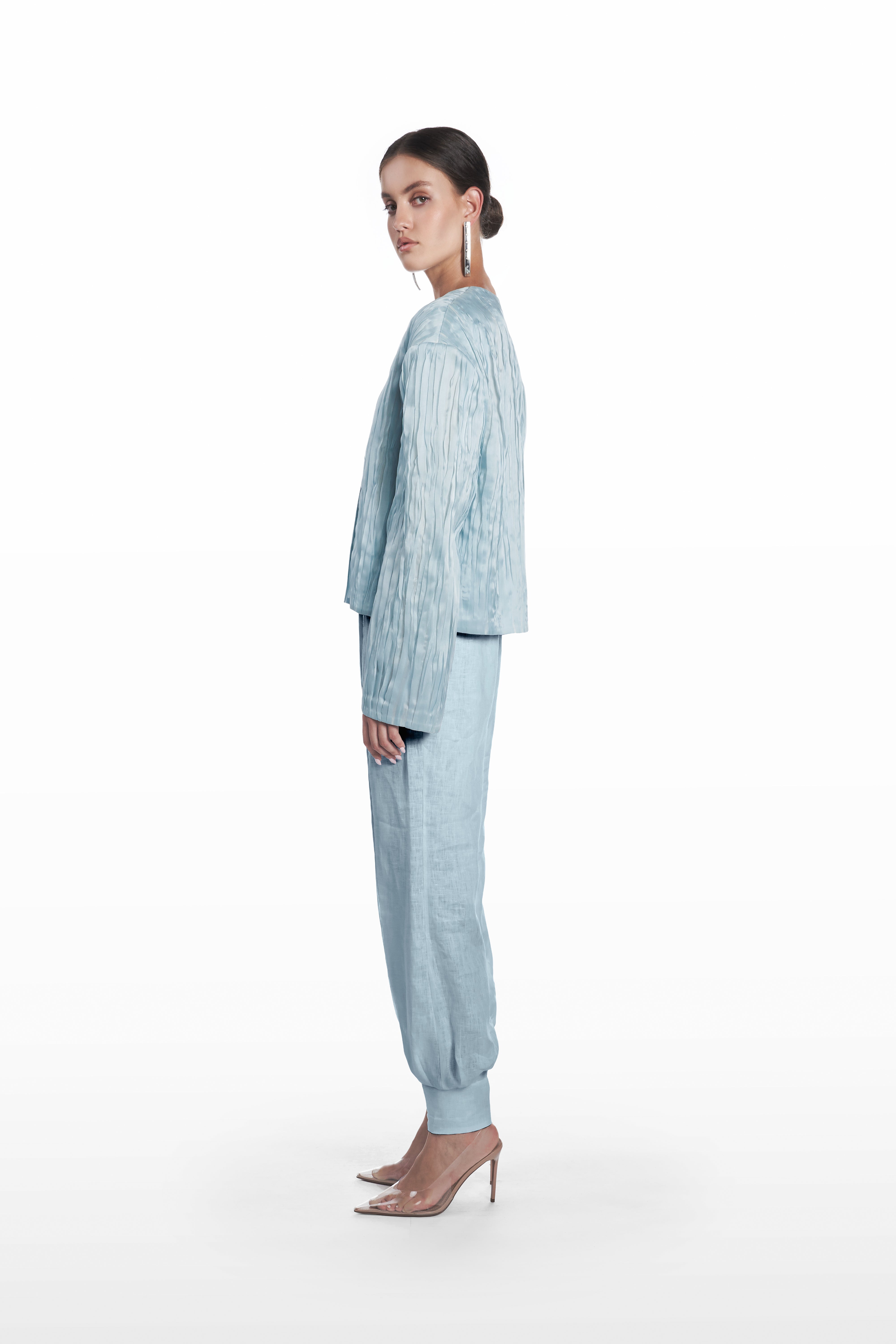 Oversize Crushed Organza Jacket in clear aqua silk organza, side view showing airy volume, fluid drape, and cropped architectural proportions