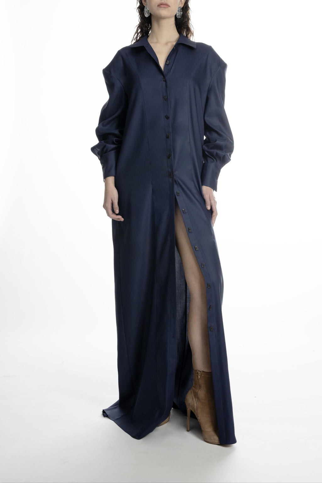 Dark Blue long shirt dress on model, front slit partly open; refined collar, statement cuffs, sleek maxi length.