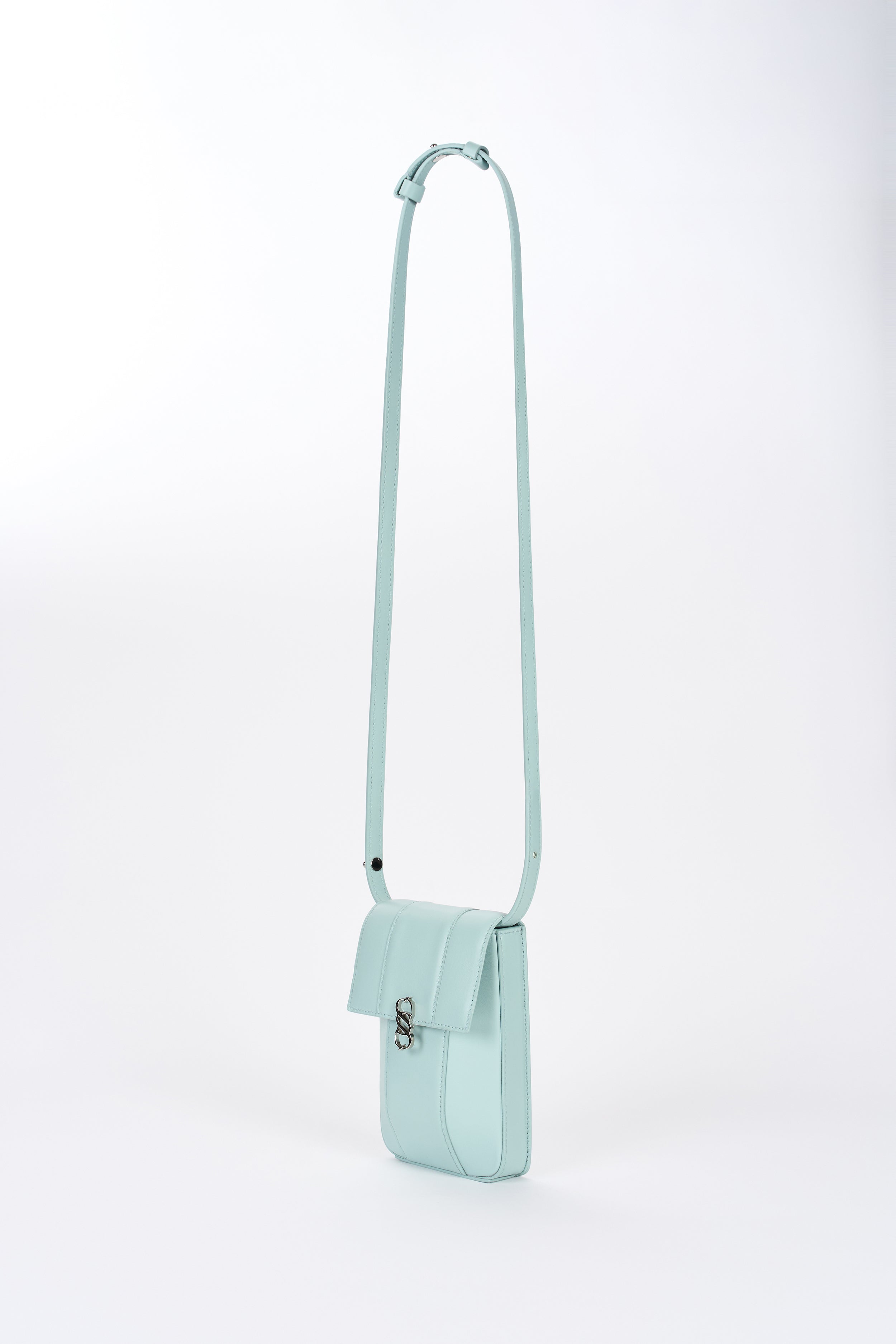 Clear aqua Il Cupolina mini leather crossbody bag angled front view with flap and silver-tone hardware